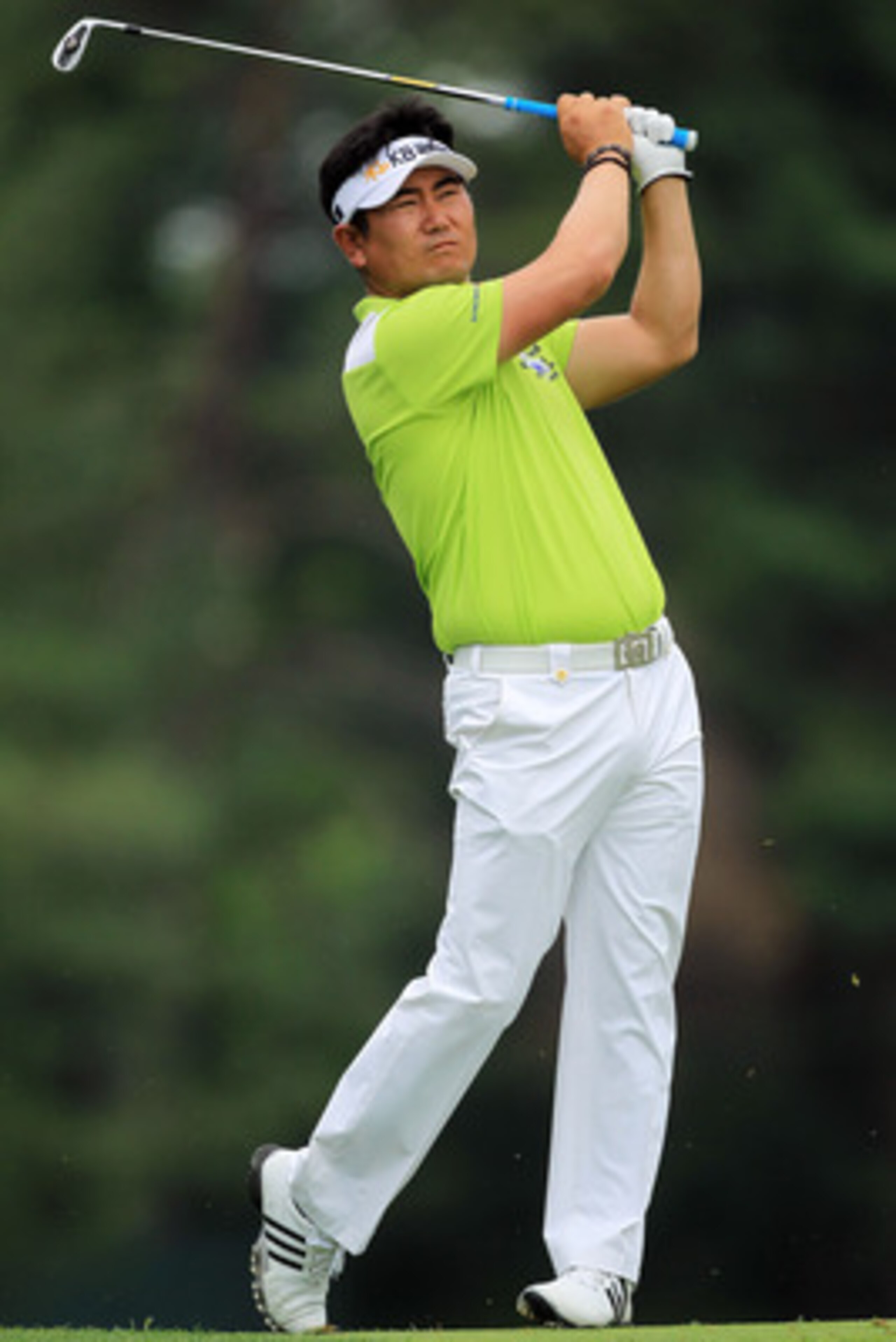 BETHESDA, MD - JUNE 16:  Y.E. Yang of South Korea watches a shot on the fifth hole during the first round of the 111th U.S. Open at Congressional Country Club on June 16, 2011 in Bethesda, Maryland.  (Photo by David Cannon/Getty Images)