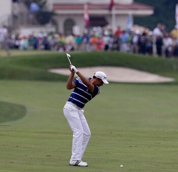 BETHESDA, MD - JUNE 16:  Alexandre Rocha of Brazil hits a shot on the ninth hole during the first round of the 111th U.S. Open at Congressional Country Club on June 16, 2011 in Bethesda, Maryland.  (Photo by Rob Carr/Getty Images)
