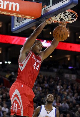 OAKLAND, CA - DECEMBER 20: Chuck Hayes #44 of the Houston Rockets dunks the ball during their game against the Golden State Warriors at Oracle Arena on December 20, 2010 in Oakland, California. NOTE TO USER: User expressly acknowledges and agrees that, b OAKLAND, CA - DECEMBER 20: Chuck Hayes #44 of the Houston Rockets dunks the ball during their game against the Golden State Warriors at Oracle Arena on December 20, 2010 in Oakland, California. NOTE TO USER: User expressly acknowledges and agrees that, b
