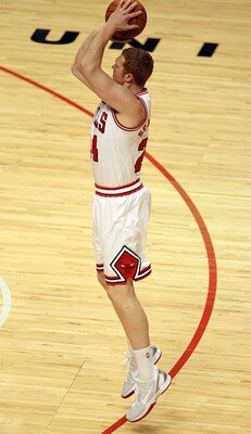 CHICAGO, IL - MARCH 11: Brian Scalabrine #24 of the Chicago Bulls puts up a shot against the Atlanta Hawks at the United Center on March 11, 2011 in Chicago, Illinois. The Bulls defeated the Hawks 94-76. NOTE TO USER: User expressly acknowledges and agree CHICAGO, IL - MARCH 11: Brian Scalabrine #24 of the Chicago Bulls puts up a shot against the Atlanta Hawks at the United Center on March 11, 2011 in Chicago, Illinois. The Bulls defeated the Hawks 94-76. NOTE TO USER: User expressly acknowledges and agree