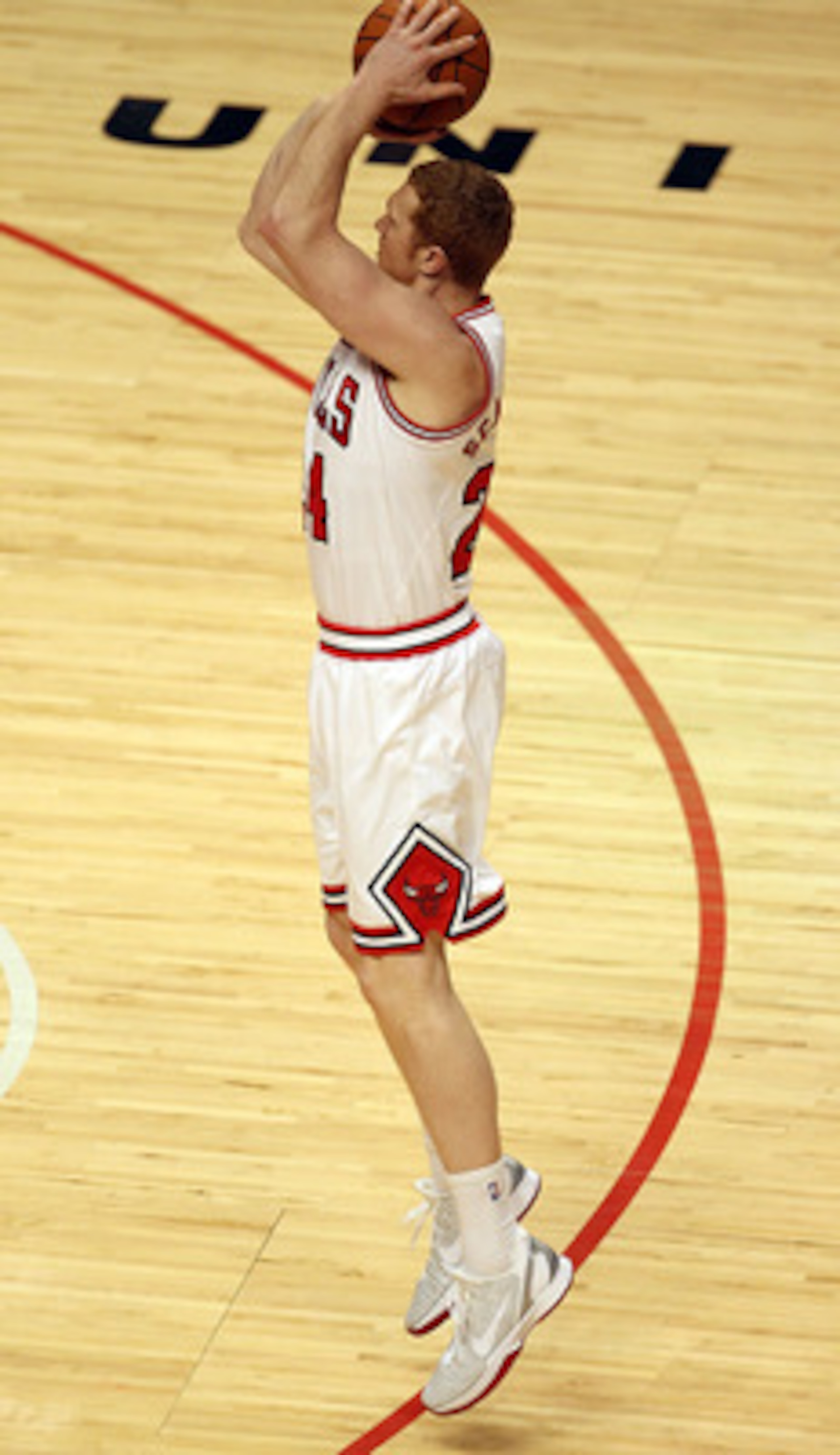 CHICAGO, IL - MARCH 11: Brian Scalabrine #24 of the Chicago Bulls puts up a shot against the Atlanta Hawks at the United Center on March 11, 2011 in Chicago, Illinois. The Bulls defeated the Hawks 94-76. NOTE TO USER: User expressly acknowledges and agree