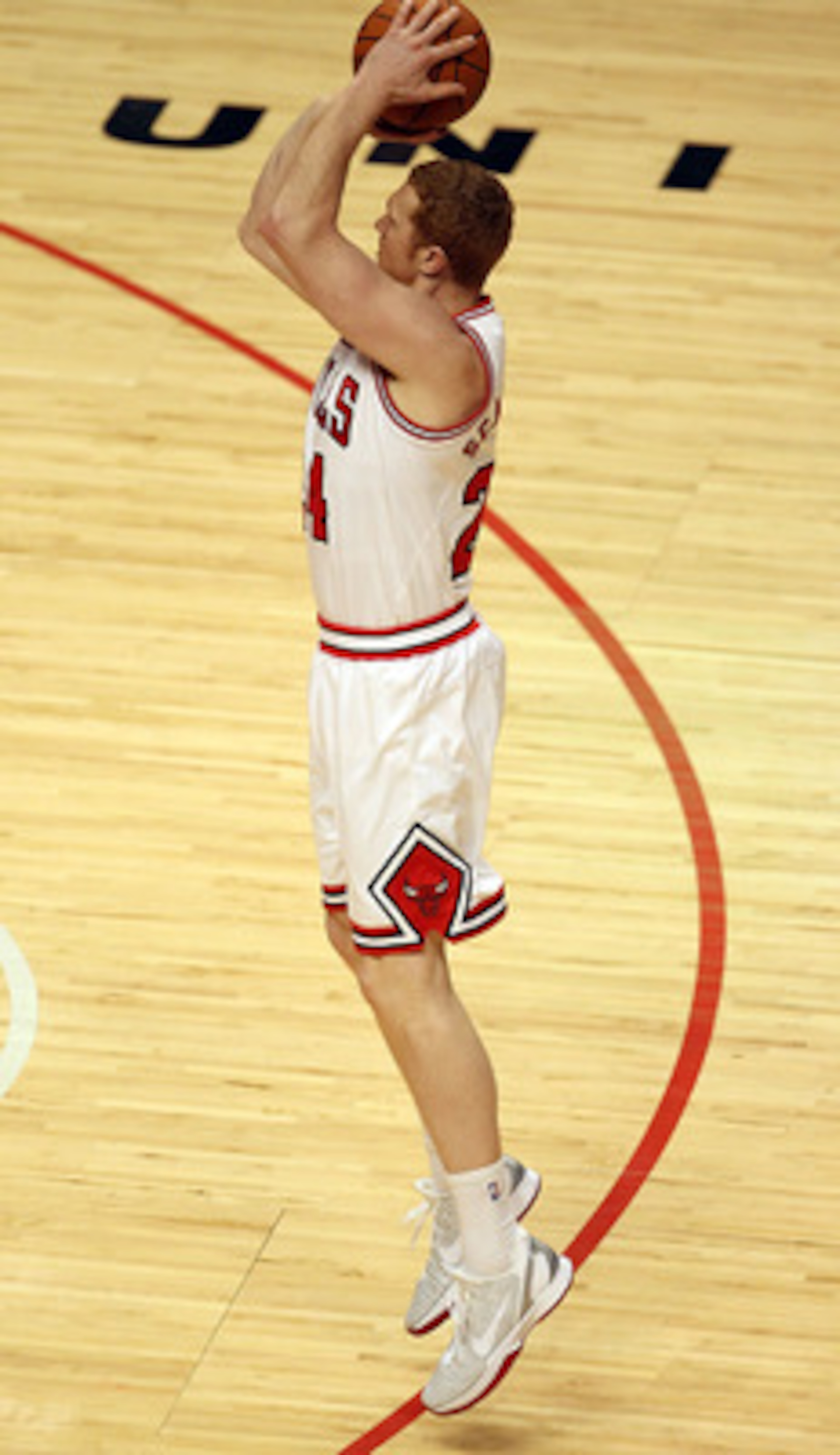 CHICAGO, IL - MARCH 11: Brian Scalabrine #24 of the Chicago Bulls puts up a shot against the Atlanta Hawks at the United Center on March 11, 2011 in Chicago, Illinois. The Bulls defeated the Hawks 94-76. NOTE TO USER: User expressly acknowledges and agree