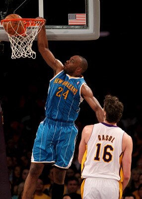 LOS ANGELES, CA - APRIL 17: Carl Landry #24 of the New Orleans Hornets dunks over Pau Gasol #16 of the Los Angeles Lakers in Game One of the Western Conference Quarterfinals in the 2011 NBA Playoffs on April 17, 2011 at Staples Center in Los Angeles, Ca LOS ANGELES, CA - APRIL 17: Carl Landry #24 of the New Orleans Hornets dunks over Pau Gasol #16 of the Los Angeles Lakers in Game One of the Western Conference Quarterfinals in the 2011 NBA Playoffs on April 17, 2011 at Staples Center in Los Angeles, Ca