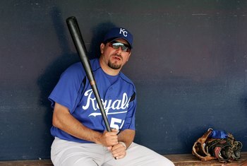 PEORIA, AZ - MARCH 23:  Benji Gil #55 of the Kansas City Royals sits in the dugout during a Spring Training Cactus League game against the San Diego Padres on March 23, 2006 at the Peoria Sports Complex in Peoria, Arizona.  (Photo by Jonathan Ferrey/Getty