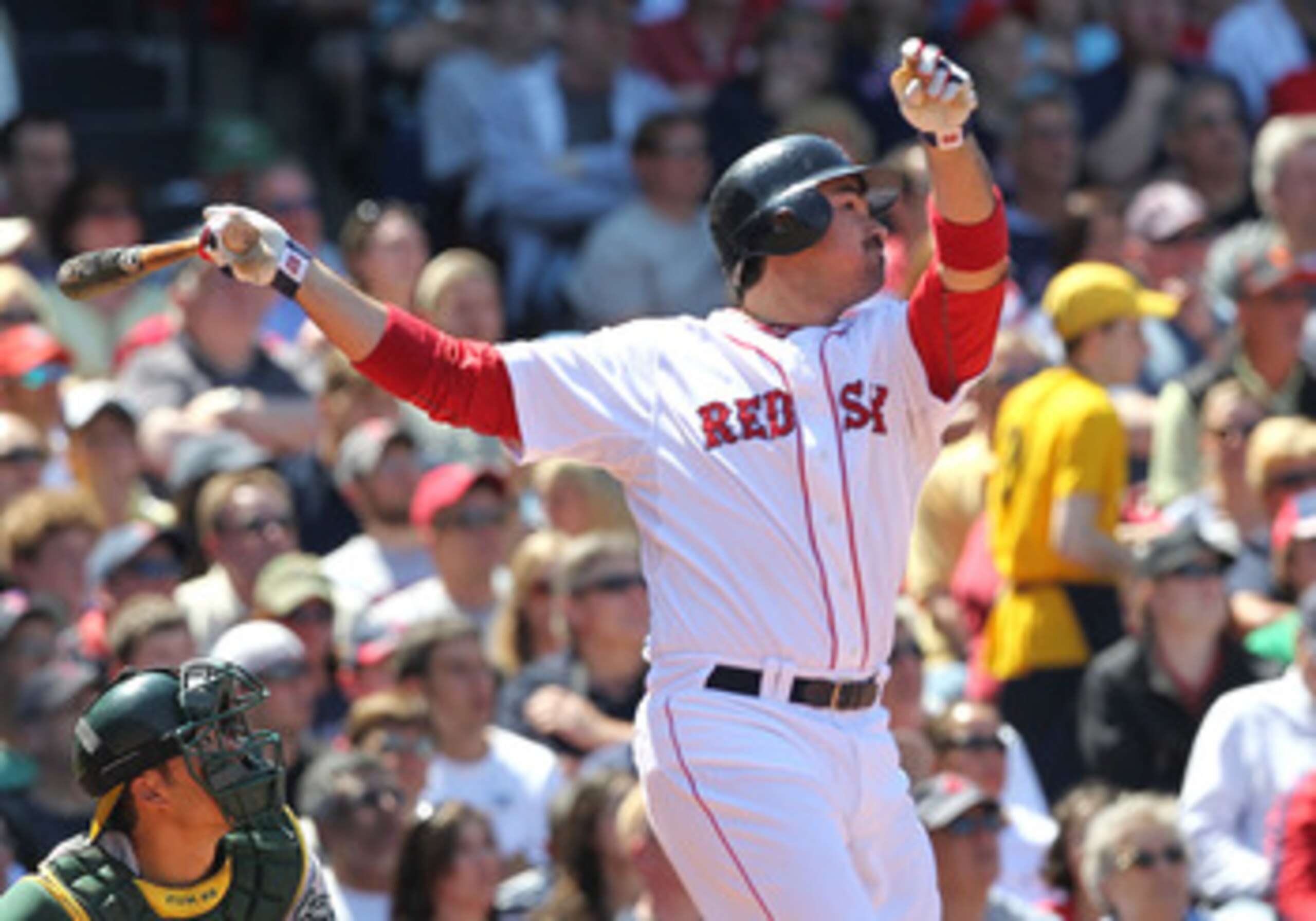 BOSTON, MA - JUNE 5:  Adrian Gonzalez #28 of the Boston Red Sox celebrates after connecting for a two-run home against the Oakland Athletics at Fenway Park on June 5, 2011 in Boston, Massachusetts.  (Photo by Jim Rogash/Getty Images)