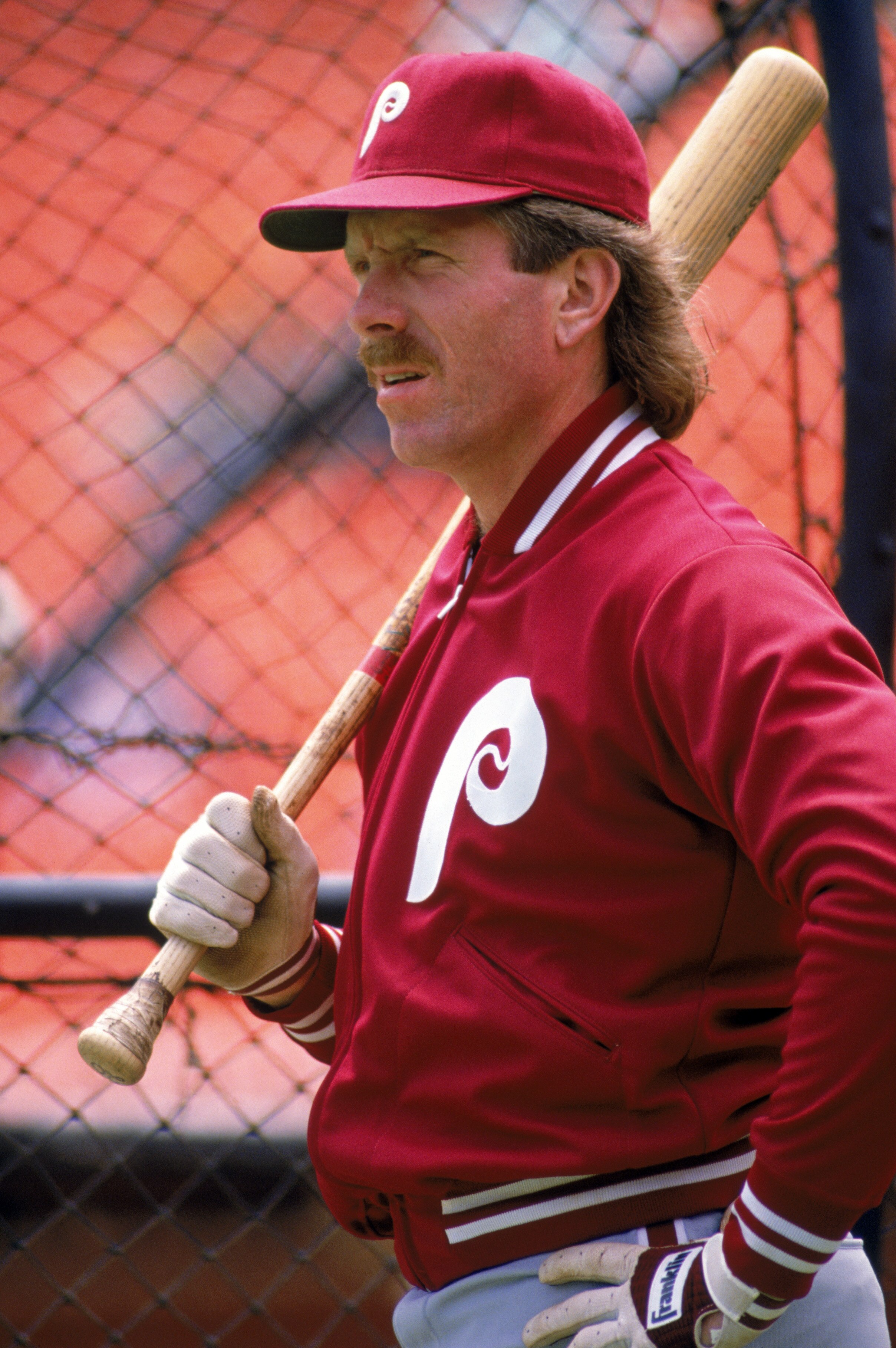 SAN FRANCISCO - 1989:  Mike Schmidt #20 of the Philadelphia Phillies stands next to a batting cage before a 1989 season game against the Giants at Candlestick Park in San Francisco, California. (Photo by Otto Greule Jr/Getty Images)