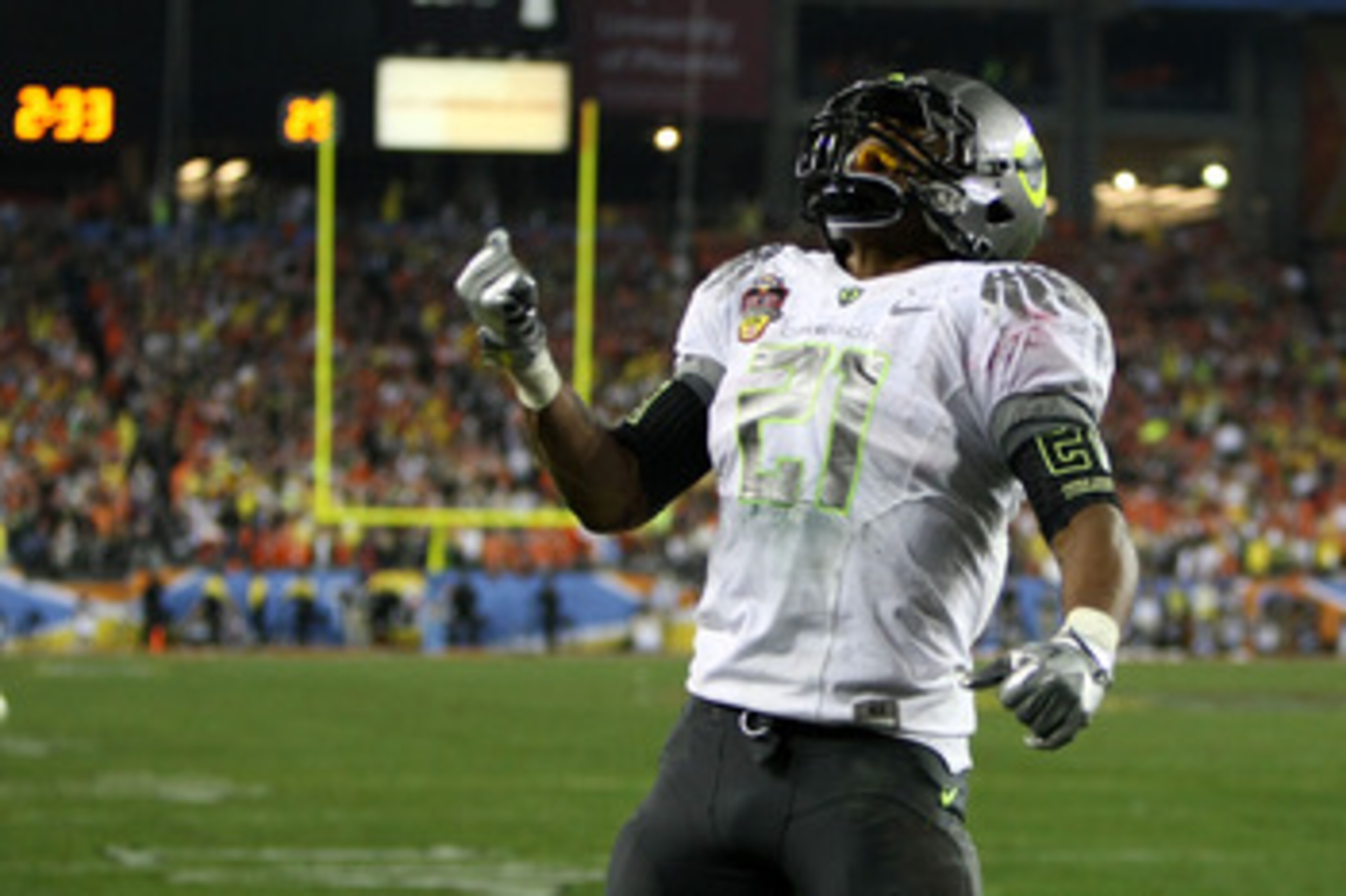 GLENDALE, AZ - JANUARY 10:  LaMichael James #21 of the Oregon Ducks reacts during their game against the Auburn Tigers during the Tostitos BCS National Championship Game at University of Phoenix Stadium on January 10, 2011 in Glendale, Arizona.  (Photo by