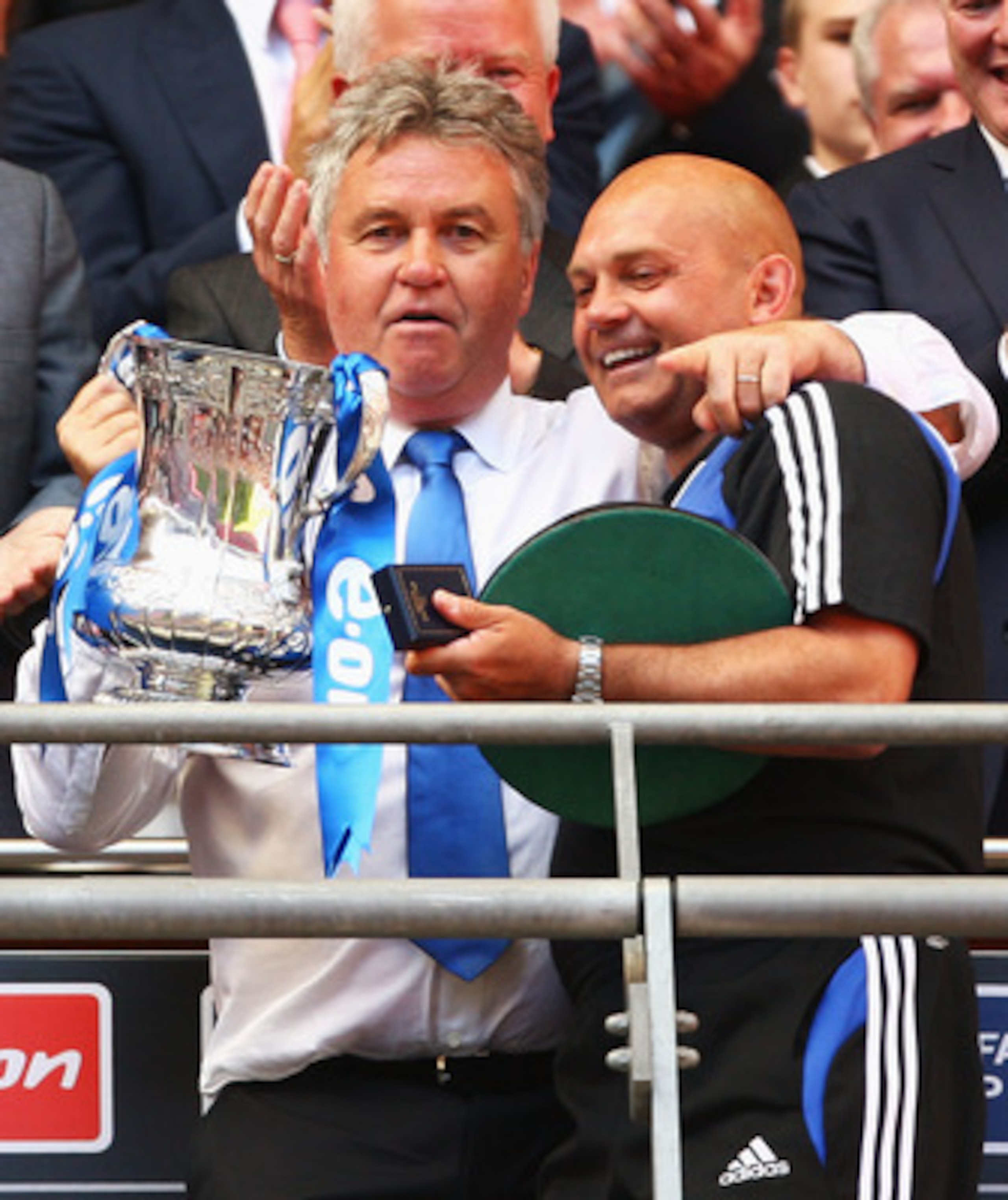 LONDON, ENGLAND - MAY 30:  Chelsea Manager Guus Hiddink lifts the trophy with assistant Ray Wilkins during the FA Cup sponsored by E.ON Final match between Chelsea and Everton at Wembley Stadium on May 30, 2009 in London, England.  (Photo by Mike Hewitt/G