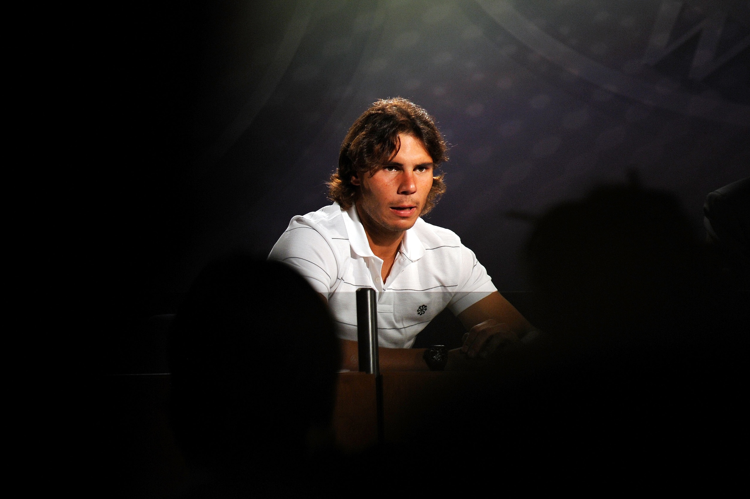 LONDON, ENGLAND - JULY 04:  2010 Men's Singles Final Champion, Rafael Nadal of Spain speaks during a press conference after defeating Tomas Berdych of Czech Republic on Day Thirteen of the Wimbledon Lawn Tennis Championships at the All England Lawn Tennis
