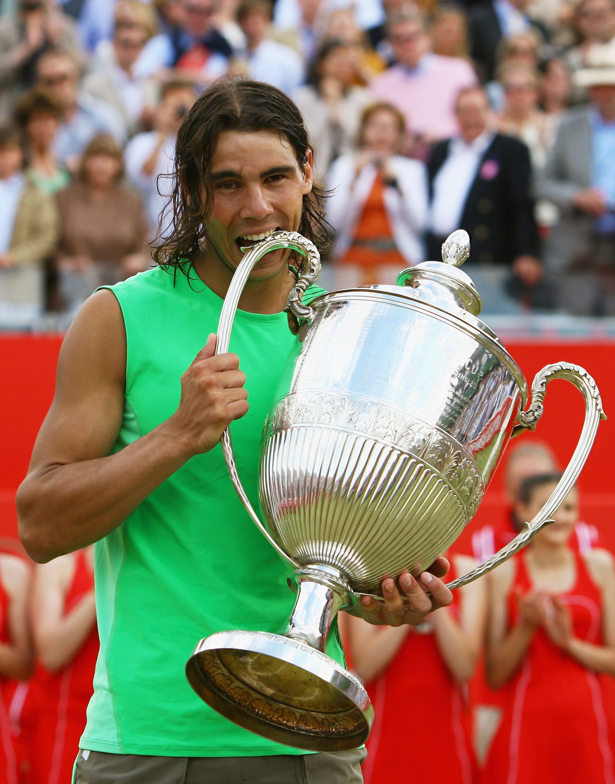 LONDON - JUNE 15:  Rafael Nadal of Spain celebrates with the trophy following his victory during the Men's Singles Final match against Novak Djokovic of Serbia on Day 7 of the Artois Championships at Queen's Club on June 15, 2008 in London, England.  (Pho