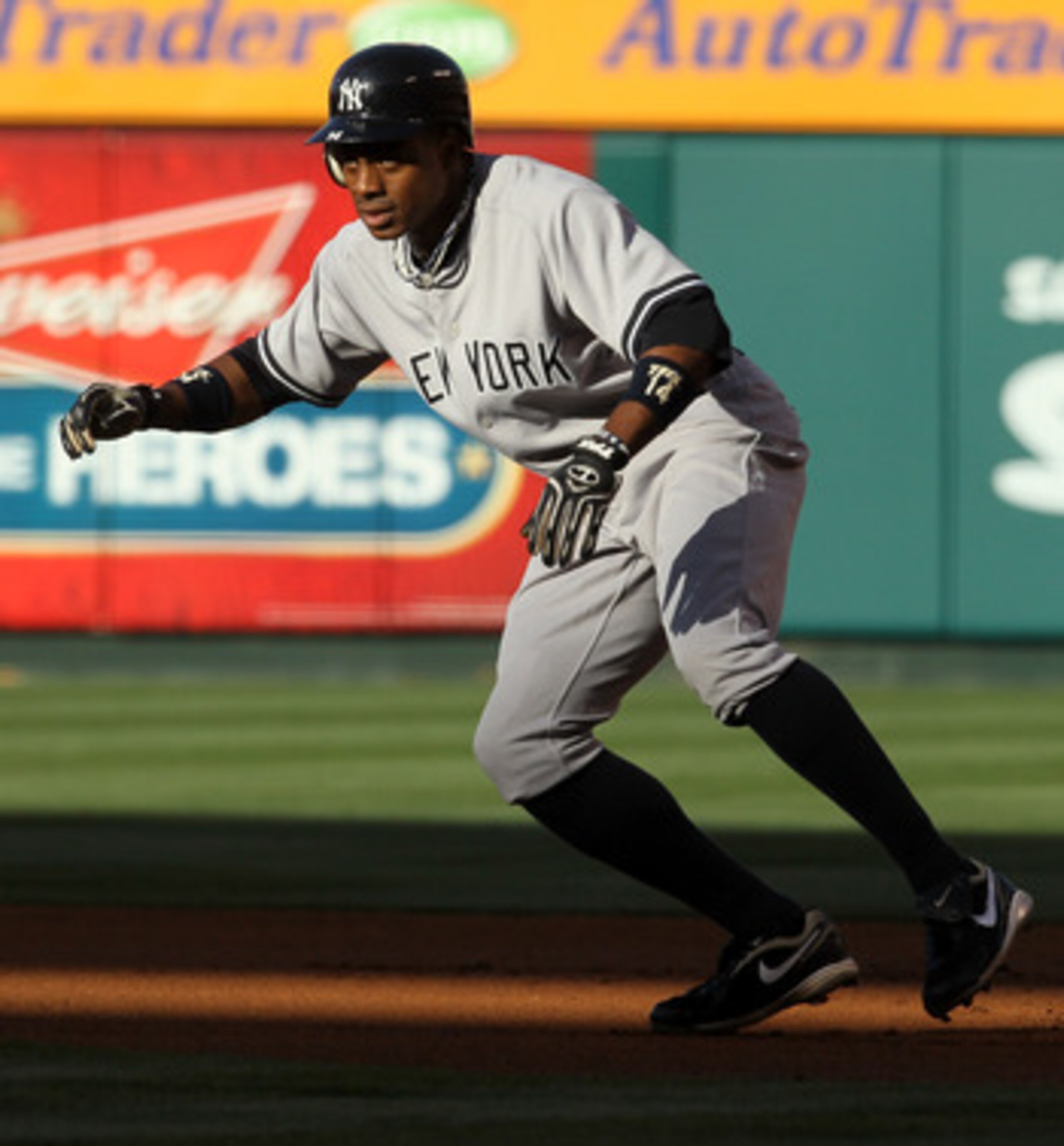 ANAHEIM, CA - JUNE 04:  Curtis Granderson #14 of the New York Yankees leads off first against the Los Angeles Angels of Anaheim on June 4, 2011 at Angel Stadium in Anaheim, California.  (Photo by Stephen Dunn/Getty Images)