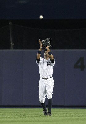 NEW YORK, NY - JUNE 07:  Curtis Granderson #14 of the New York Yankees in action during their game on June 7, 2011 at Yankee Stadium in the Bronx borough of New York City.  (Photo by Al Bello/Getty Images)