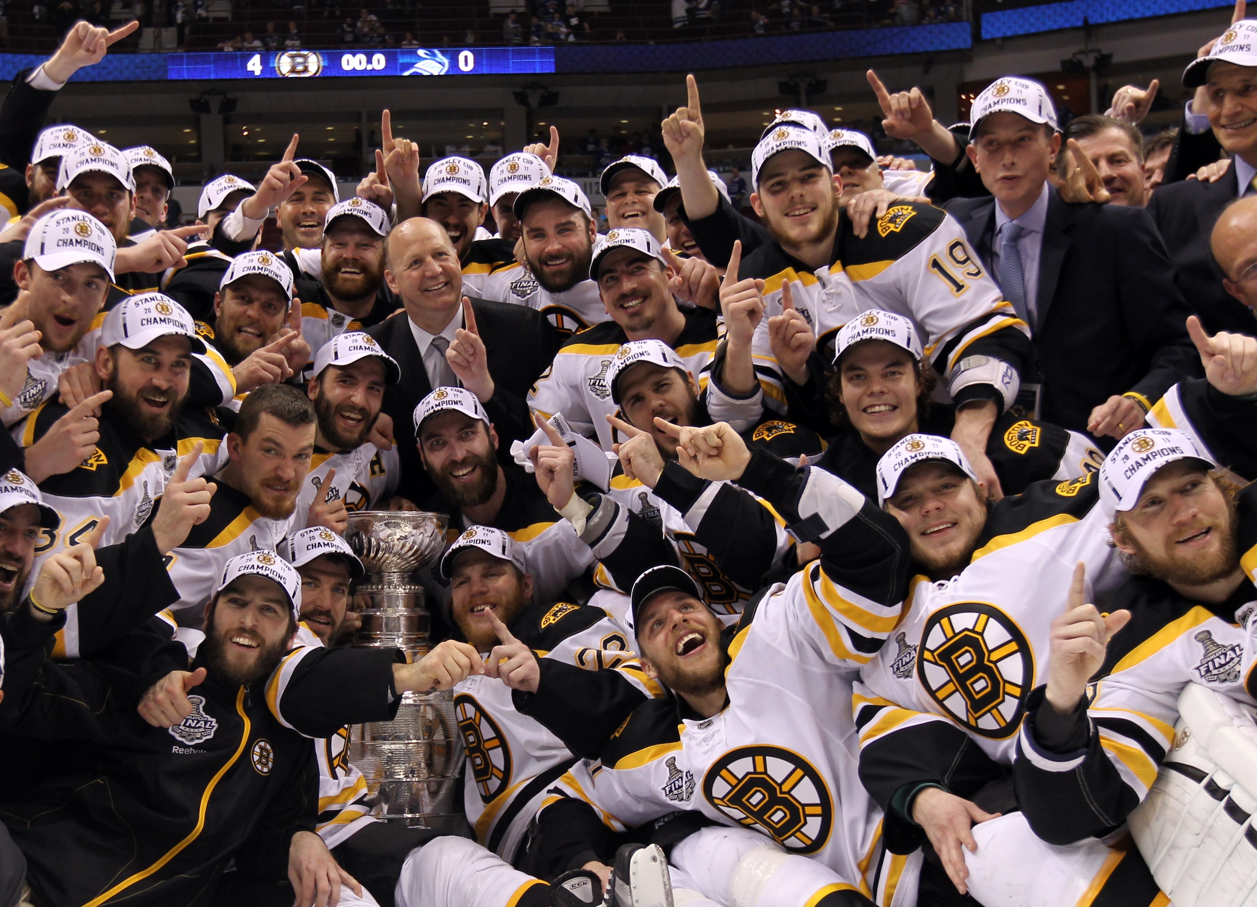 VANCOUVER, BC - JUNE 15:  The Boston Bruins pose with the Stanley Cup after defeating the Vancouver Canucks in Game Seven of the 2011 NHL Stanley Cup Final at Rogers Arena on June 15, 2011 in Vancouver, British Columbia, Canada. The Boston Bruins defeated
