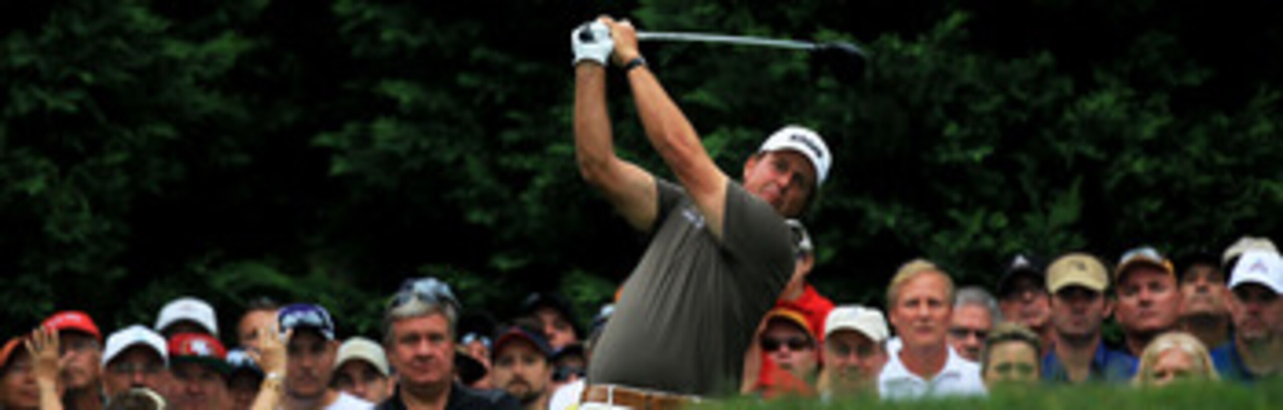 BETHESDA, MD - JUNE 17:  Phil Mickelson hits his tee shot on the fifth hole during the second round of the 111th U.S. Open at Congressional Country Club on June 17, 2011 in Bethesda, Maryland.  (Photo by David Cannon/Getty Images)