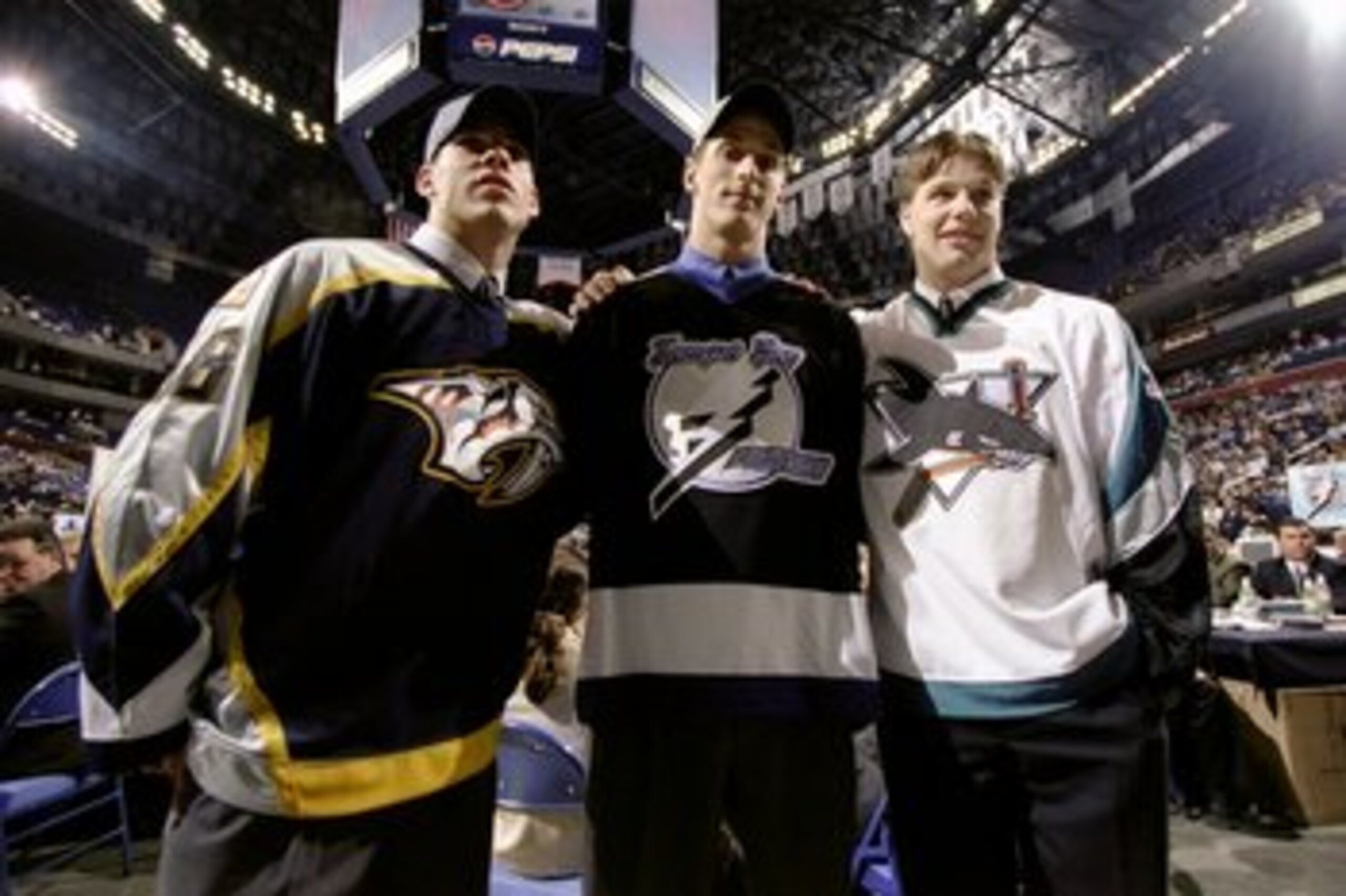 27 Jun 1998:  First round picks (L-R) David Legwand of the Nashville Predators, Vincent Lecavalier of the Tampa Bay Lightning and Brad Stuart of the San Jose Sharks pose for a group shot during the 1998 NHL Entry Draft at the Marine Midland Arena in Buffa