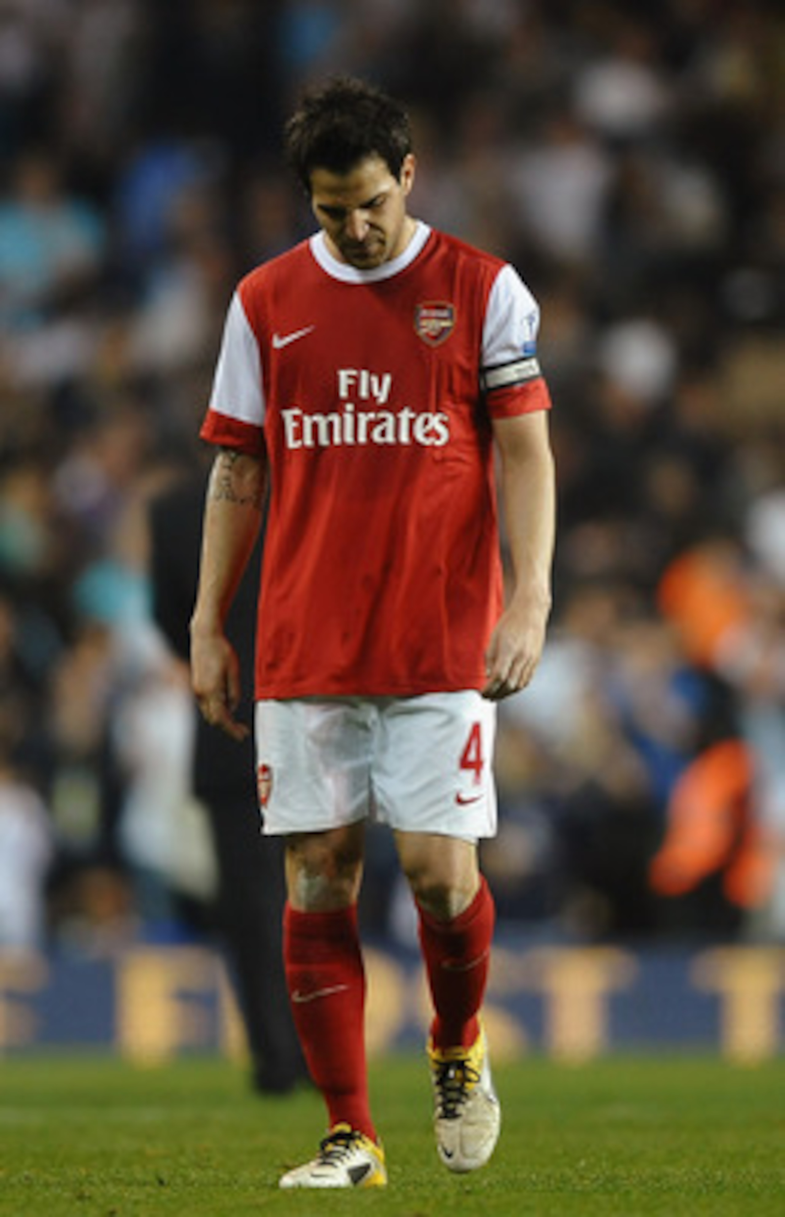 LONDON, ENGLAND - APRIL 20: Cesc Fabregas of Arsenal walks off dejected after the Barclays Premier League match between Tottenham Hotspur and Arsenal at White Hart Lane on April 20, 2011 in London, England. (Photo by Laurence Griffiths/Getty Images) LONDON, ENGLAND - APRIL 20: Cesc Fabregas of Arsenal walks off dejected after the Barclays Premier League match between Tottenham Hotspur and Arsenal at White Hart Lane on April 20, 2011 in London, England. (Photo by Laurence Griffiths/Getty Images)