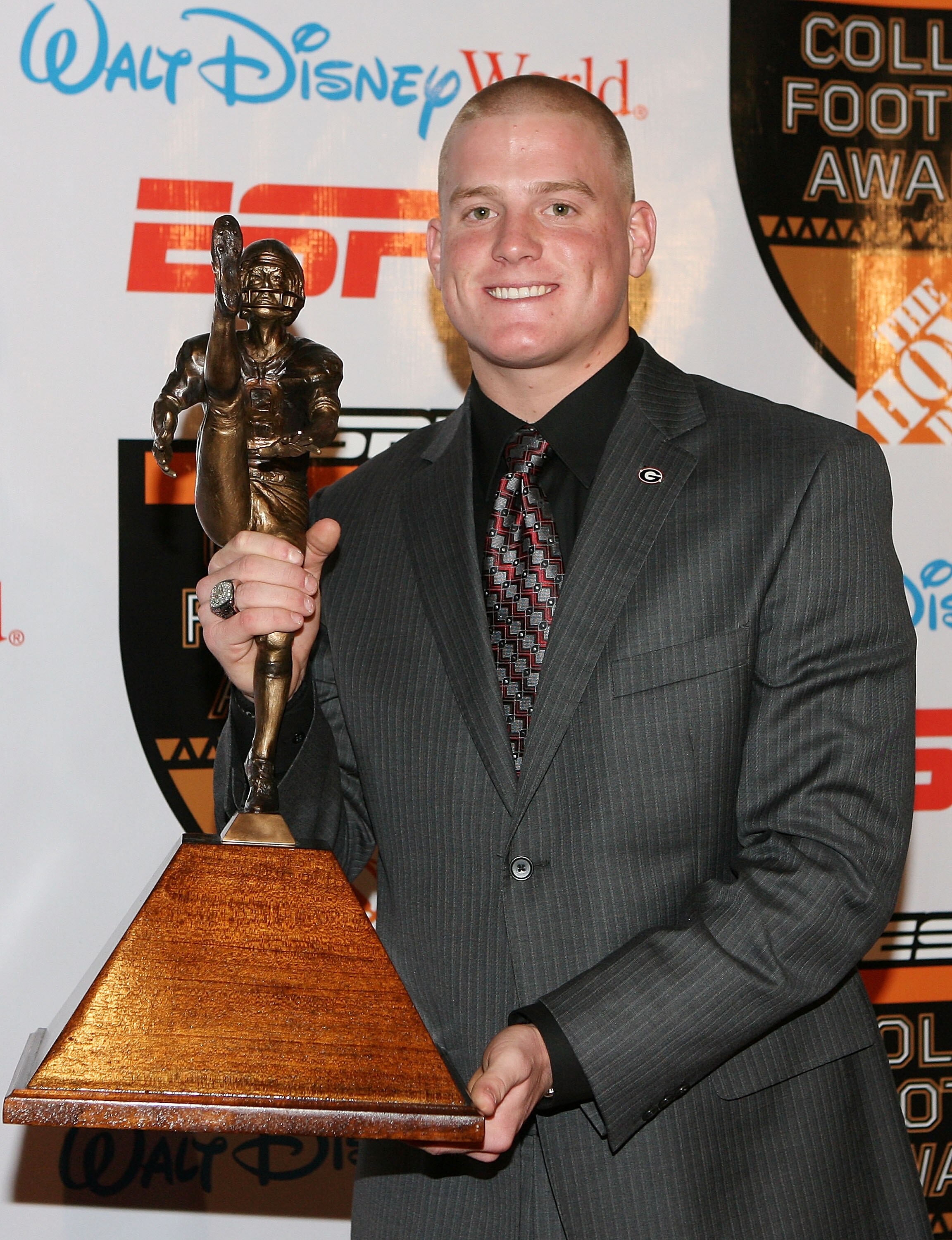 Drew Butler holding his 2009 Ray Guy Award