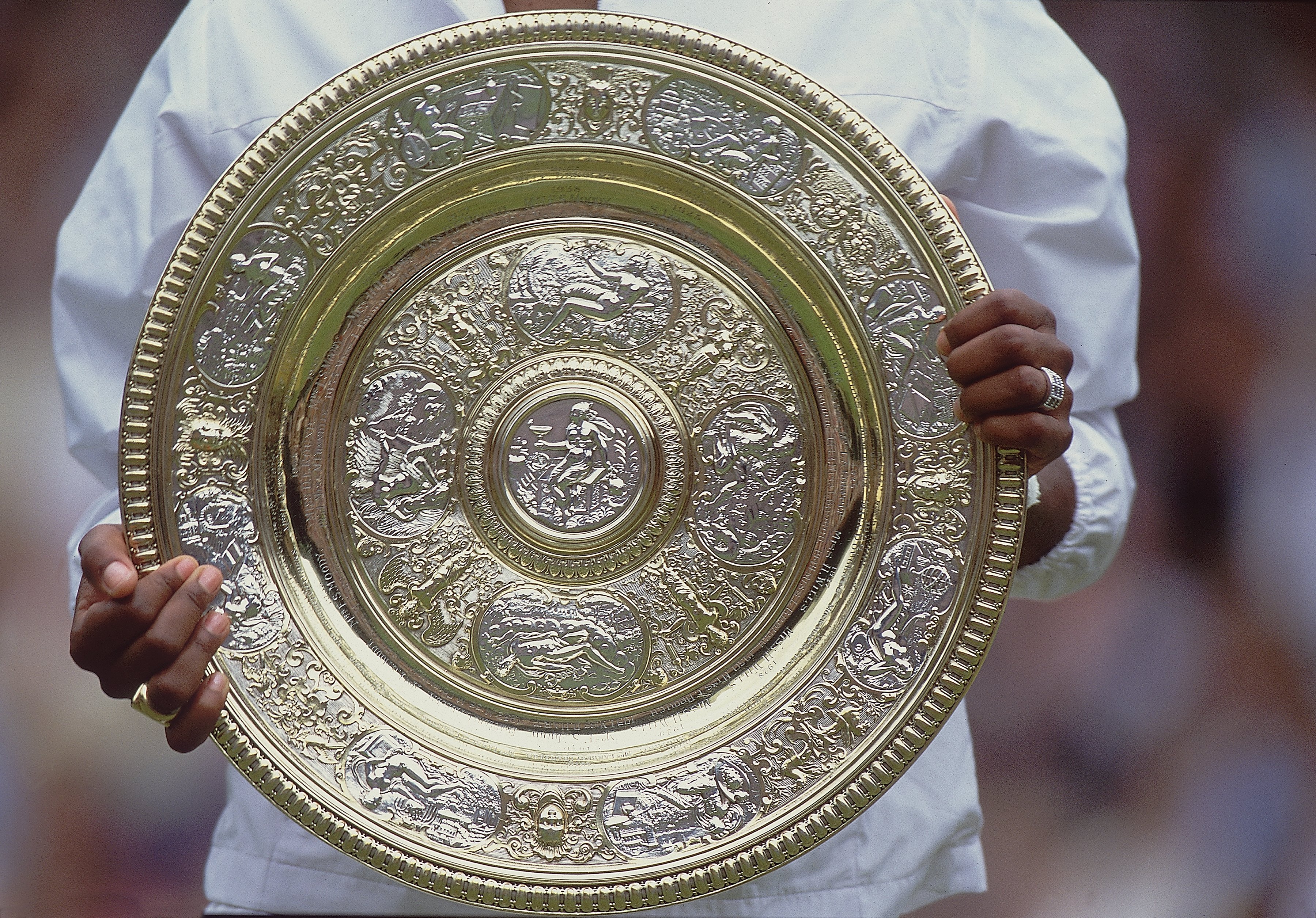 8 Jul 2001:  Venus Williams of the USA lifts the Venus Rosewater Dish after winning the ladies final of the Wimbledon Lawn Tennis Championship held at the All England Lawn Tennis and Croquet Club, in Wimbledon, London. \ Mandatory Credit: Gary M Prior/All