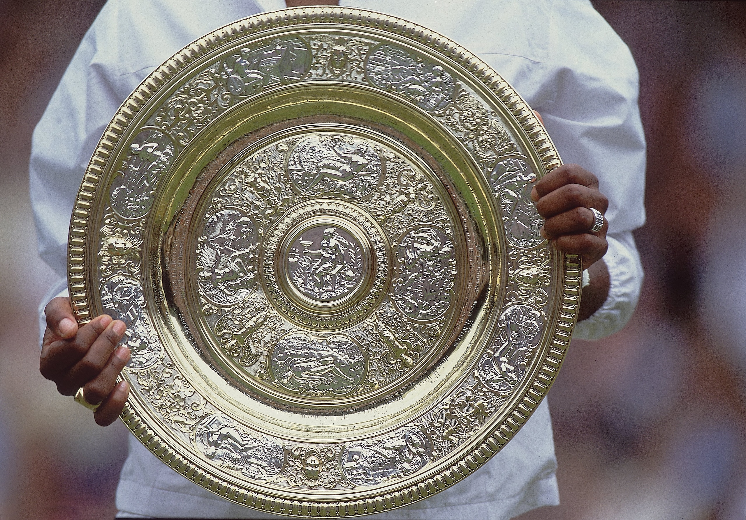 8 Jul 2001:  Venus Williams of the USA lifts the Venus Rosewater Dish after winning the ladies final of the Wimbledon Lawn Tennis Championship held at the All England Lawn Tennis and Croquet Club, in Wimbledon, London. \ Mandatory Credit: Gary M Prior/All