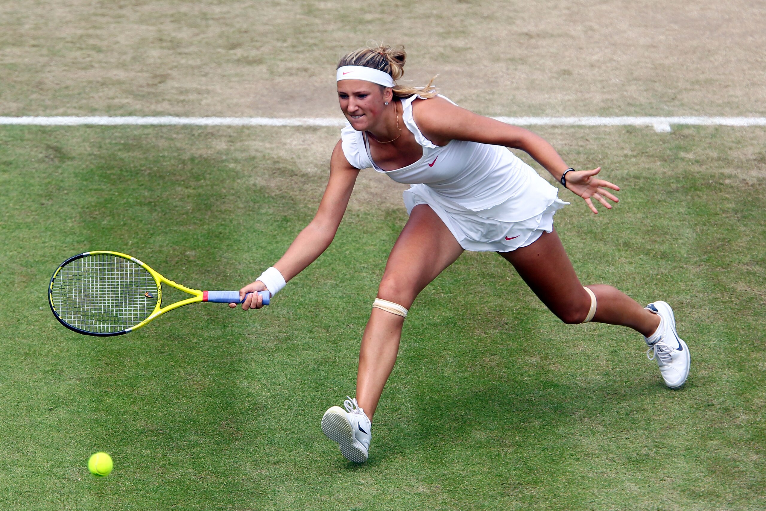 LONDON, ENGLAND - JUNE 26:  Victoria Azarenka of Belarus in action during her match against Petra Kvitova on Day Six of the Wimbledon Lawn Tennis Championships at the All England Lawn Tennis and Croquet Club on June 26, 2010 in London, England.  (Photo by