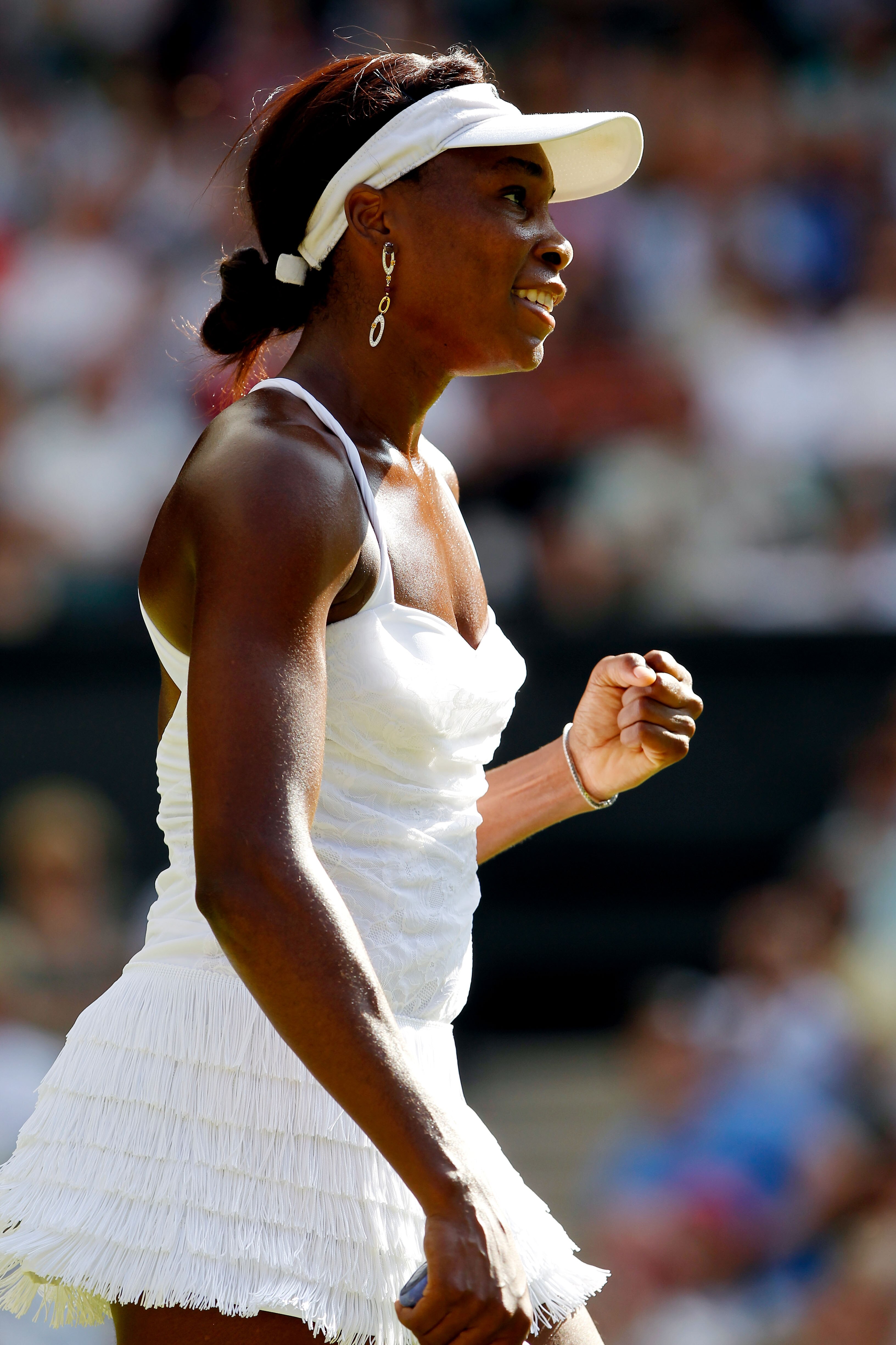 LONDON, ENGLAND - JUNE 23:  Venus Williams of USA celebrates winning her second round match against Ekaterina Makarova of Russia on Day Three of the Wimbledon Lawn Tennis Championships at the All England Lawn Tennis and Croquet Club on June 23, 2010 in Lo
