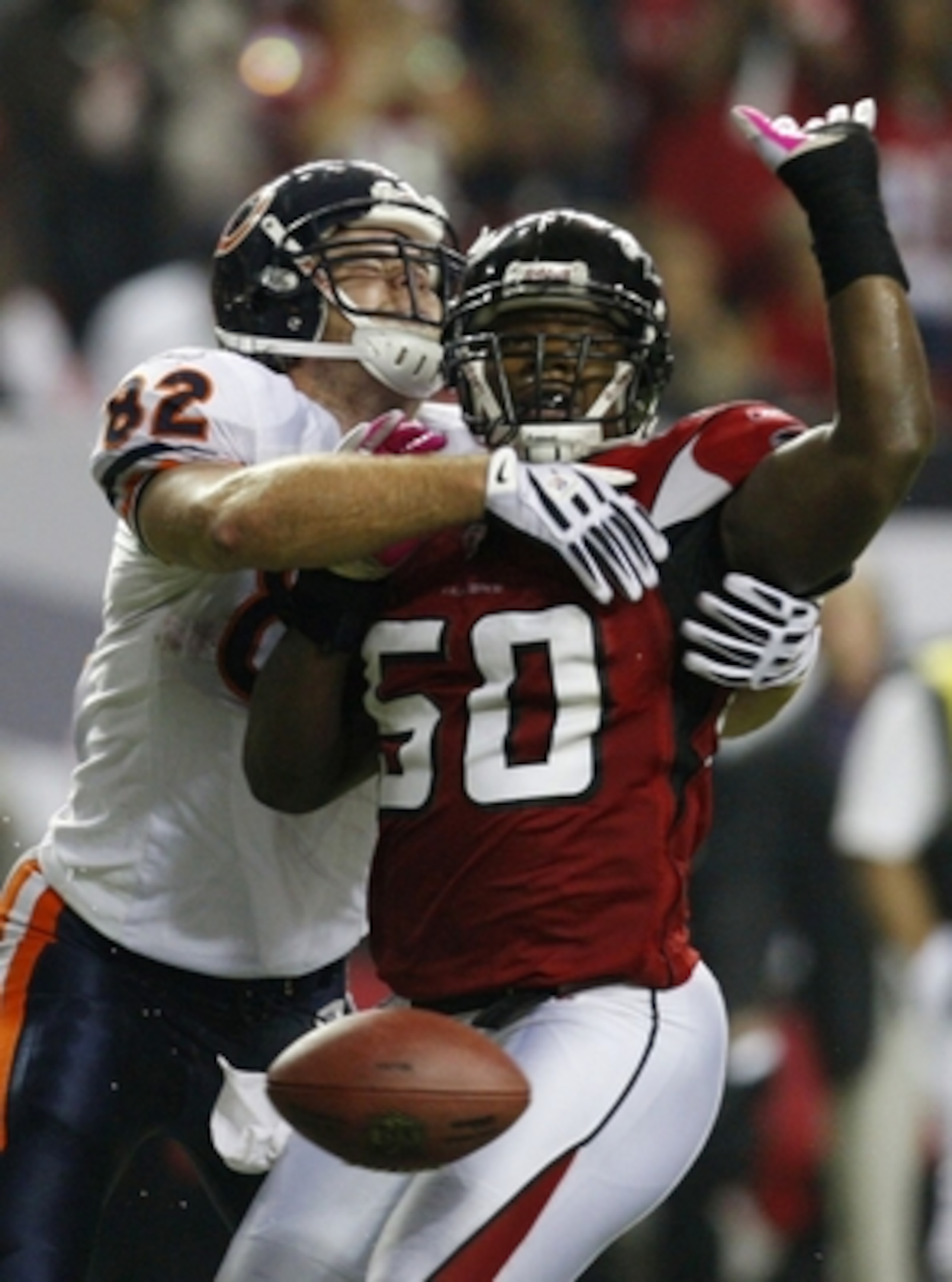 ATLANTA - OCTOBER 18:  Greg Olsen #82 of the Chicago Bears breaks up a pass intended for Curtis Lofton #50 of the Atlanta Falcons during the game at the Georgia Dome on October 18, 2009 in Atlanta, Georgia. The Falcons won the game 21-14. (Photo by Kevin