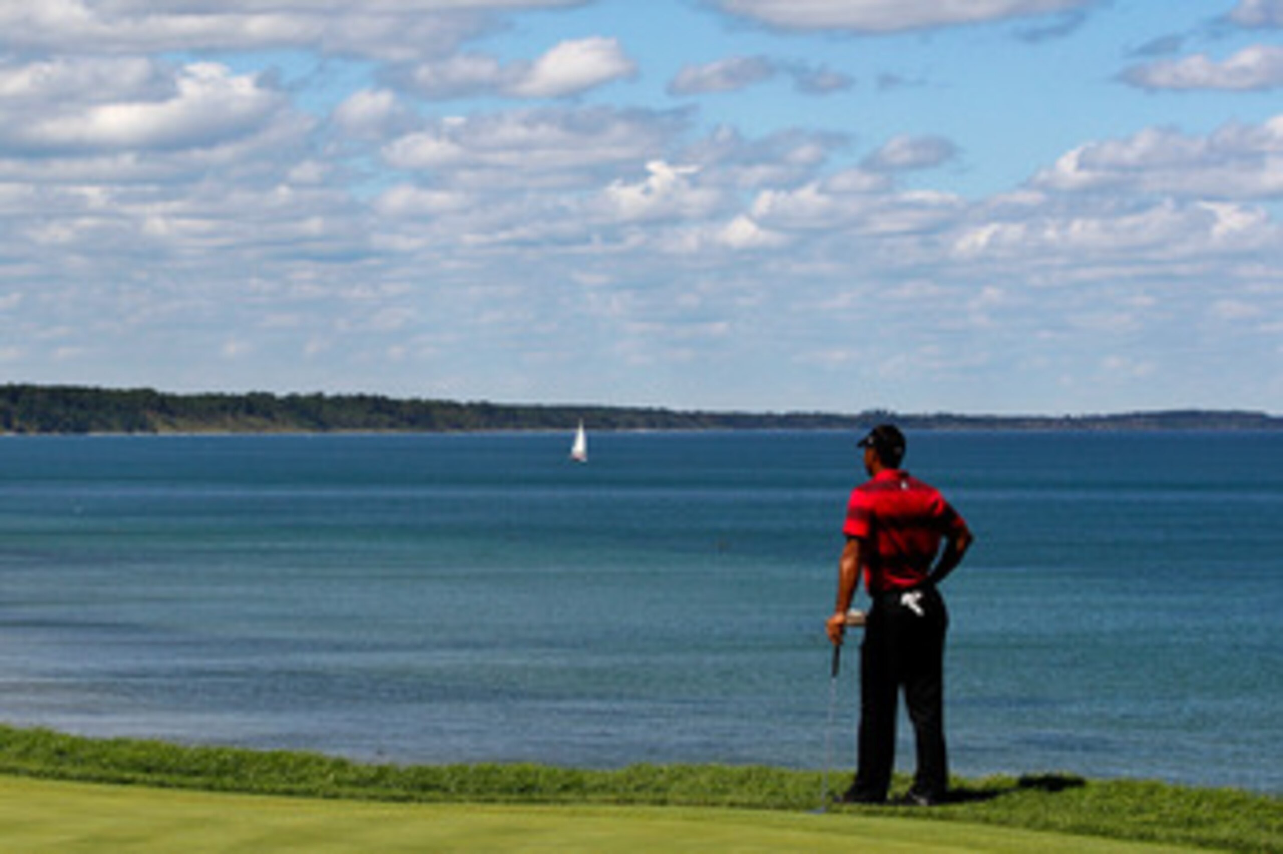 KOHLER, WI - AUGUST 15:  Tiger Woods waits on the 16th green during the final round of the 92nd PGA Championship on the Straits Course at Whistling Straits on August 15, 2010 in Kohler, Wisconsin.  (Photo by Sam Greenwood/Getty Images)