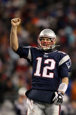 FOXBORO, MA - DECEMBER 06:  Tom Brady #12 of the New England Patriots celebrates after BenJarvus Green-Ellis #42 scored a 5-yard rushing touchdown in the fourth quarter against the New York Jets at Gillette Stadium on December 6, 2010 in Foxboro, Massachu