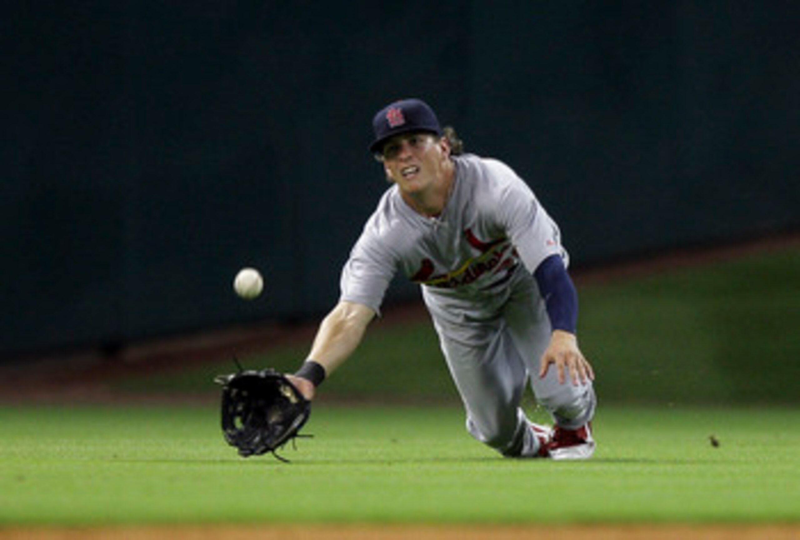 CINCINNATI, OH - MAY 14: Colby Rasmus #28 of the St. Louis Cardinals can't make the catch on a home run ball in the fifth inning by Ramon Hernandez of the Cincinnati Reds at Great American Ball Park on May 14, 2011 in Cincinnati, Ohio. The Reds defeated t CINCINNATI, OH - MAY 14: Colby Rasmus #28 of the St. Louis Cardinals can't make the catch on a home run ball in the fifth inning by Ramon Hernandez of the Cincinnati Reds at Great American Ball Park on May 14, 2011 in Cincinnati, Ohio. The Reds defeated t