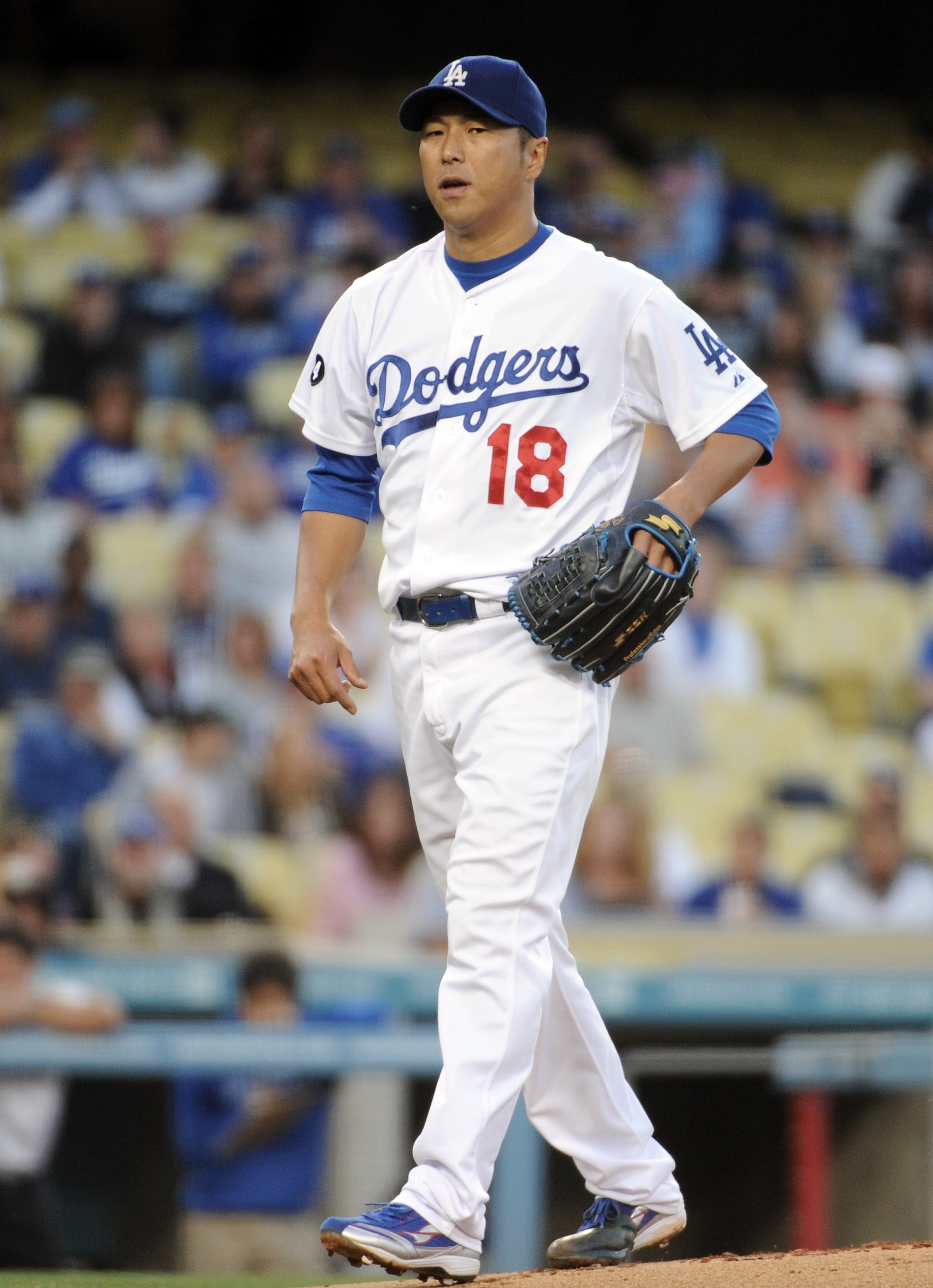 LOS ANGELES, CA - APRIL 30:  Hiroki Kuroda #18 of the Los Angeles Dodgers pitches during the first inning at Dodger Stadium on April 30, 2011 in Los Angeles, California.  (Photo by Harry How/Getty Images)