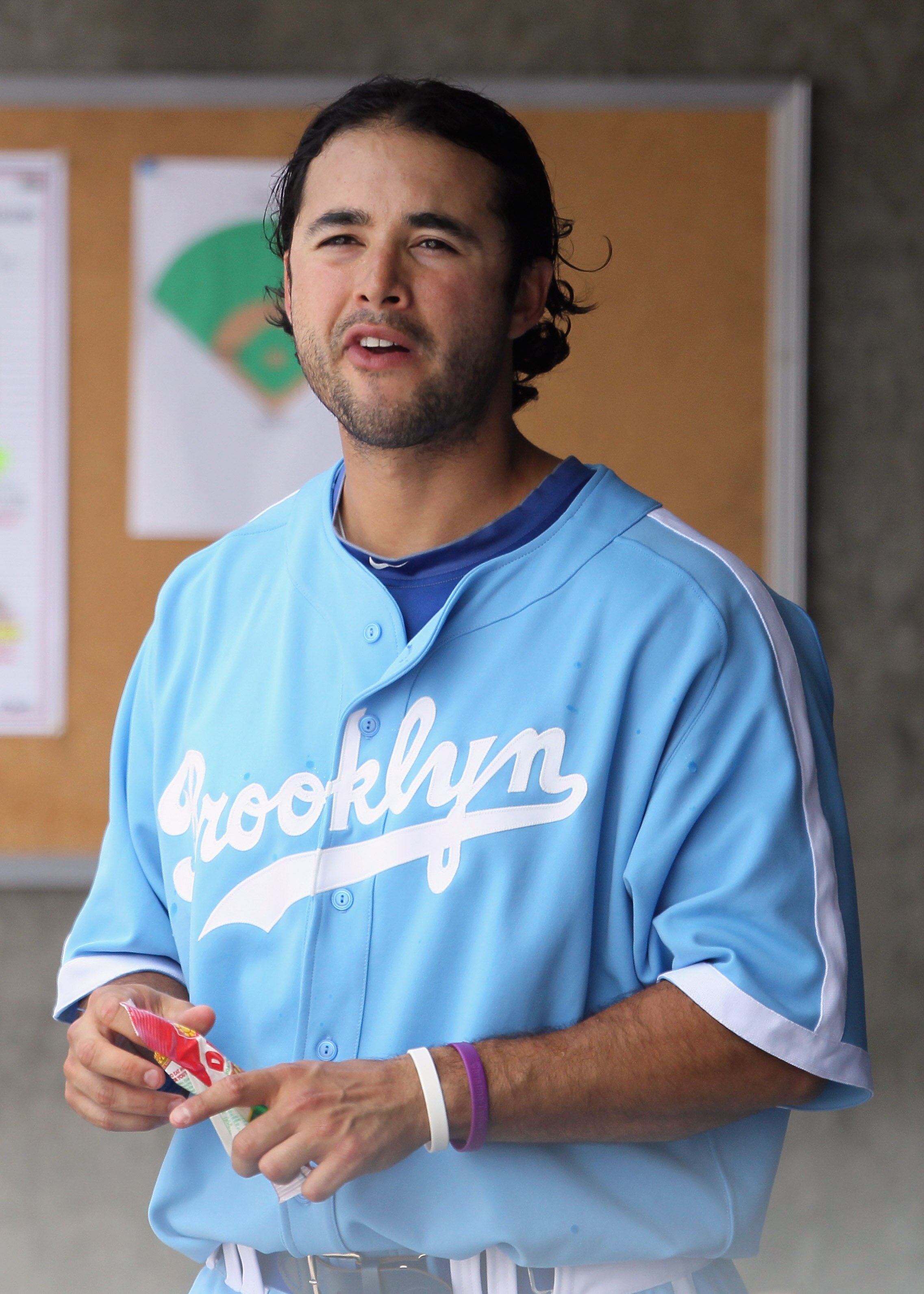 LOS ANGELES, CA - APRIL 21:  Andre Ethier #16 of the Los Angeles Dodgers looks on from the dugout against the Atlanta Braves at Dodger Stadium on April 21, 2011 in Los Angeles, California.  (Photo by Jeff Gross/Getty Images)