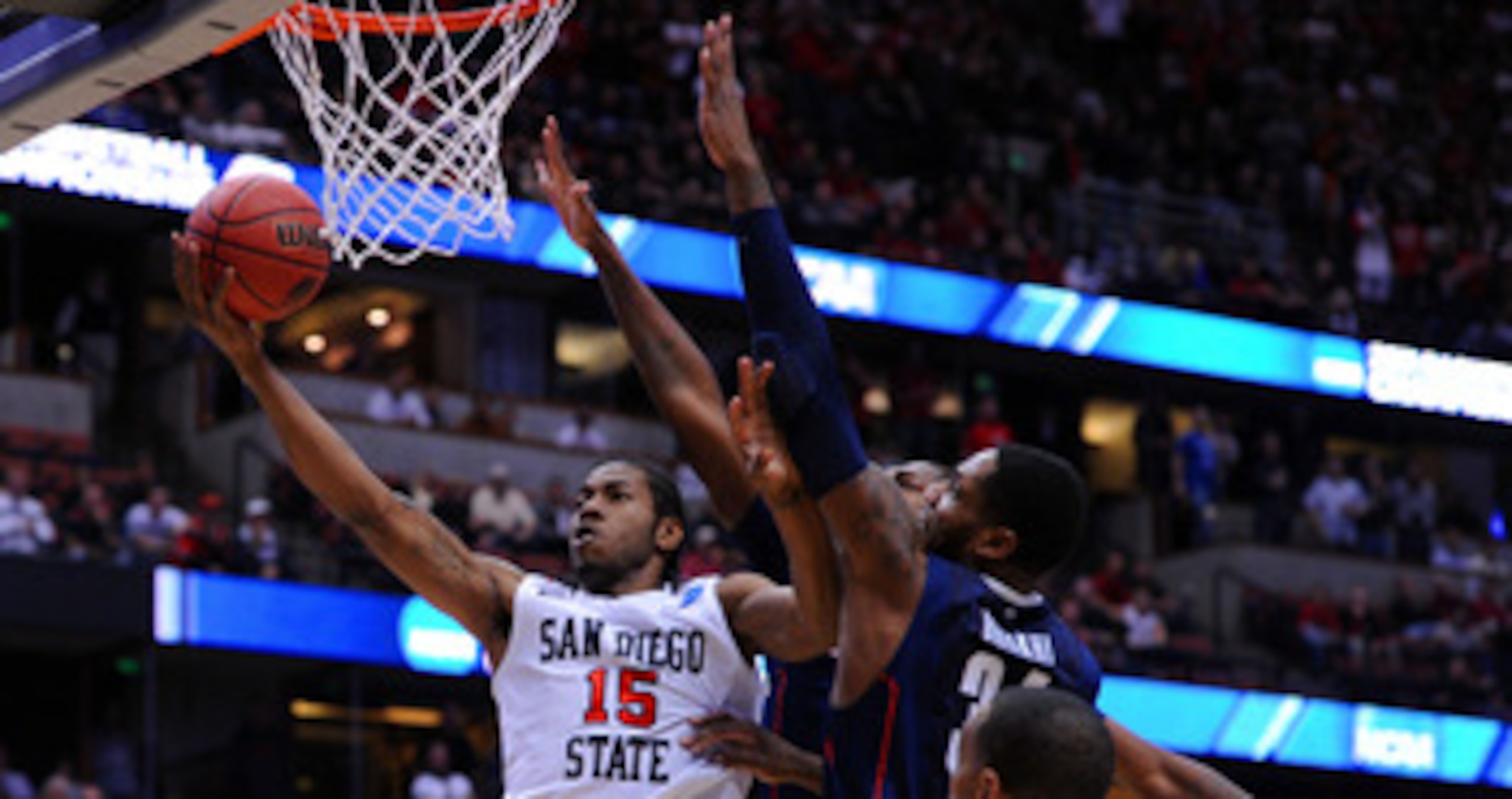 ANAHEIM, CA - MARCH 24: Kawhi Leonard #15 of the San Diego State Aztecs goes to the hoop against Alex Oriakhi #34 of the Connecticut Huskies during the west regional semifinal of the 2011 NCAA men's basketball tournament at the Honda Center on March 24, ANAHEIM, CA - MARCH 24: Kawhi Leonard #15 of the San Diego State Aztecs goes to the hoop against Alex Oriakhi #34 of the Connecticut Huskies during the west regional semifinal of the 2011 NCAA men's basketball tournament at the Honda Center on March 24,