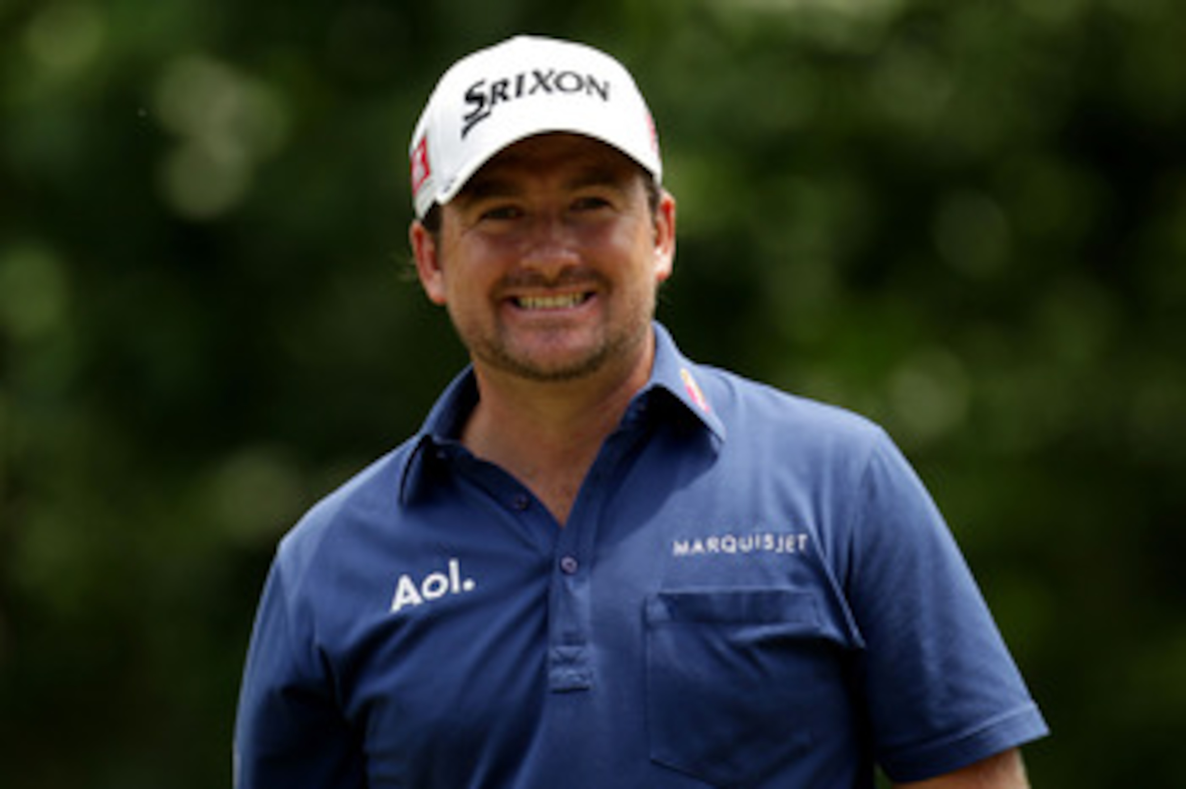 BETHESDA, MD - JUNE 16:  Graeme McDowell of Northern Ireland walks across a green during the first round of the 111th U.S. Open at Congressional Country Club on June 16, 2011 in Bethesda, Maryland.  (Photo by Ross Kinnaird/Getty Images)