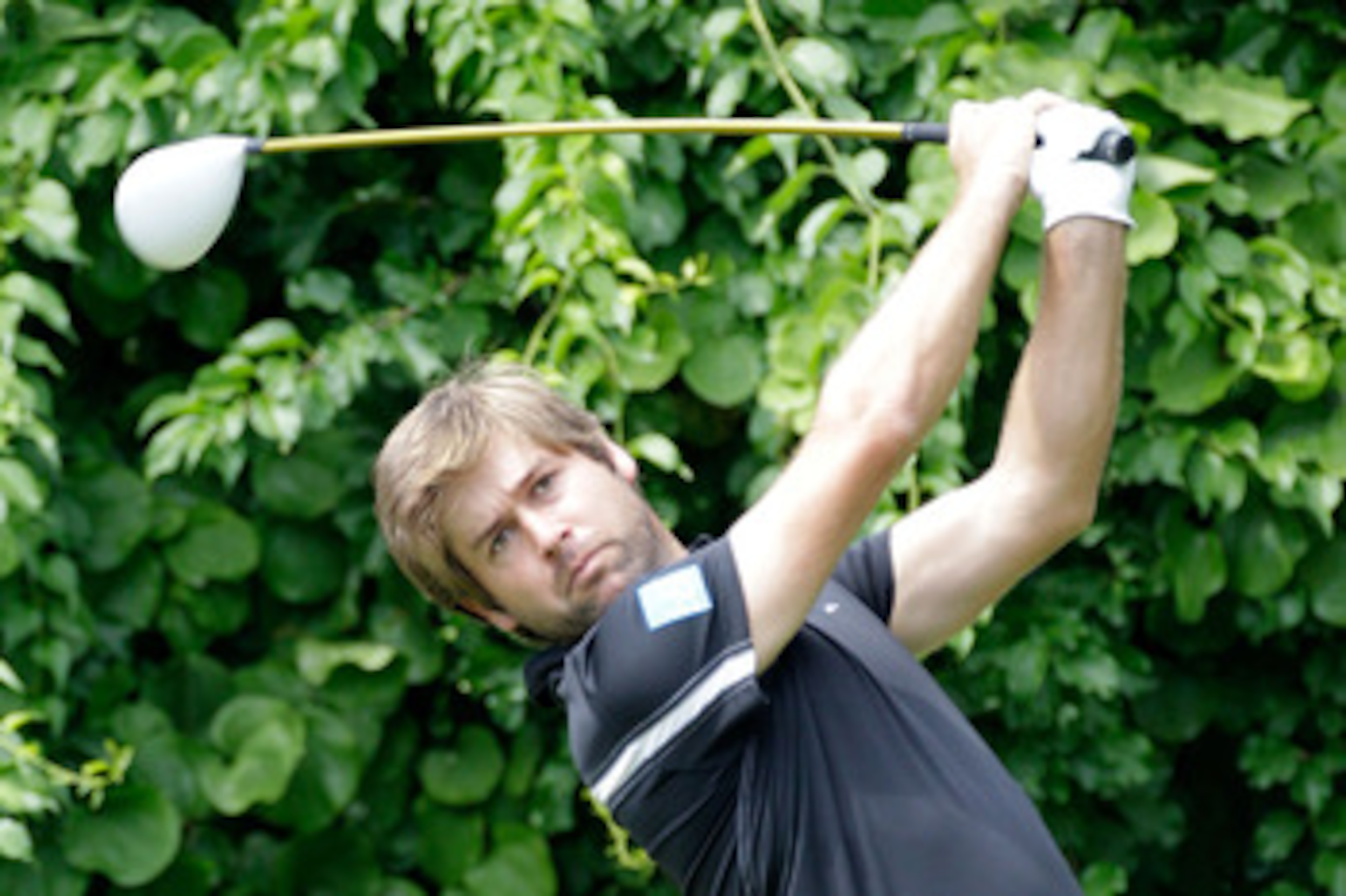 BETHESDA, MD - JUNE 17:  Robert Rock of England hits a tee shot during the second round of the 111th U.S. Open at Congressional Country Club on June 17, 2011 in Bethesda, Maryland.  (Photo by Rob Carr/Getty Images)