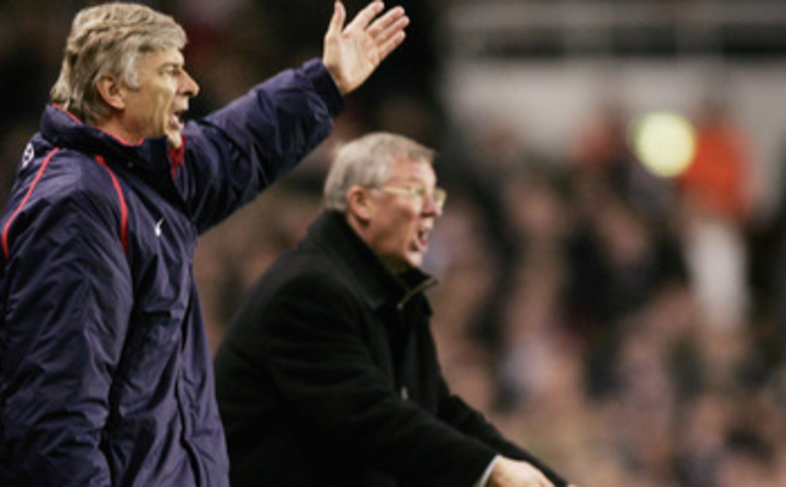 LONDON - FEBRUARY 1: Arsenal manager, Arsene Wenger and Manchester United Manager, Alex Ferguson, yell instructions from the sidelines during the Barclays Premiership match between Arsenal and Manchester United at Highbury on February 1, 2005 in London, E