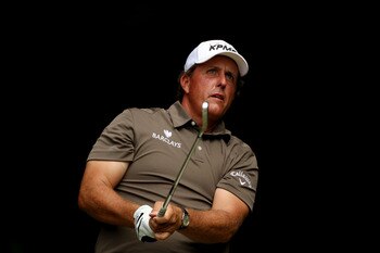 BETHESDA, MD - JUNE 17:  Phil Mickelson hits his tee shot on the 13th hole during the second round of the 111th U.S. Open at Congressional Country Club on June 17, 2011 in Bethesda, Maryland.  (Photo by Andrew Redington/Getty Images)