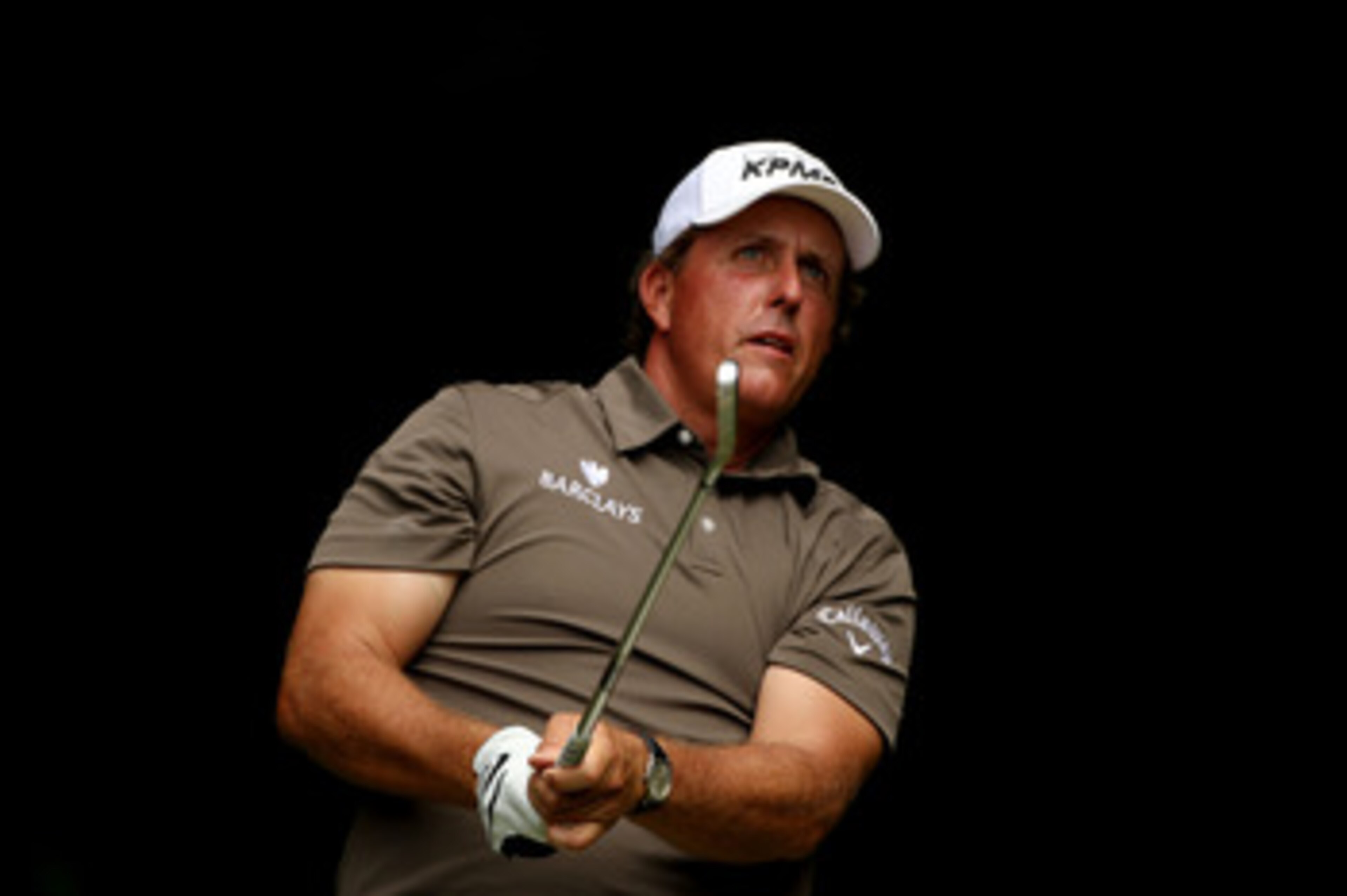 BETHESDA, MD - JUNE 17:  Phil Mickelson hits his tee shot on the 13th hole during the second round of the 111th U.S. Open at Congressional Country Club on June 17, 2011 in Bethesda, Maryland.  (Photo by Andrew Redington/Getty Images)