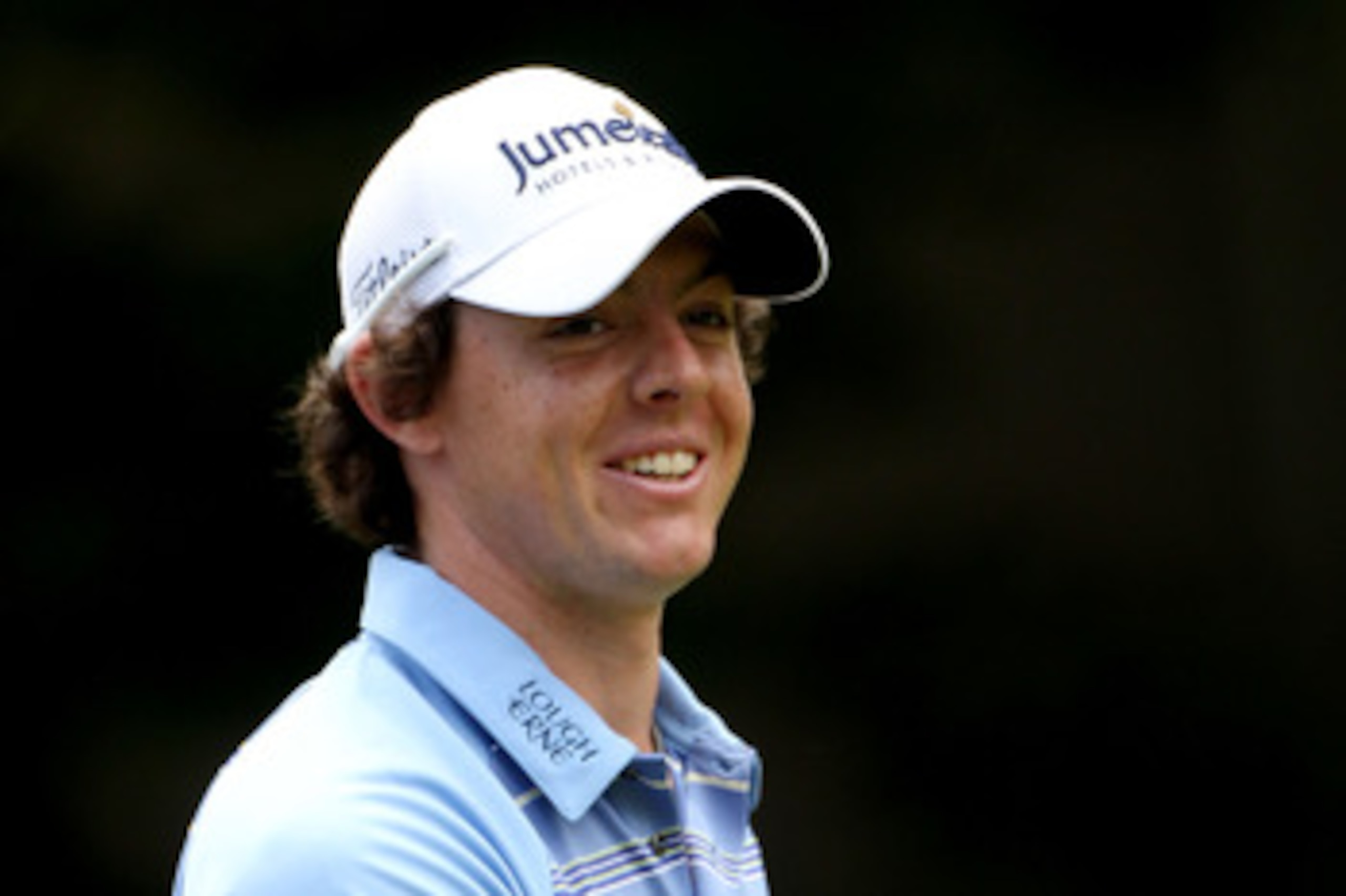 BETHESDA, MD - JUNE 17:  Rory McIlroy of Northern Ireland smiles as he walks off the 11th green during the second round of the 111th U.S. Open at Congressional Country Club on June 17, 2011 in Bethesda, Maryland.  (Photo by Andrew Redington/Getty Images)