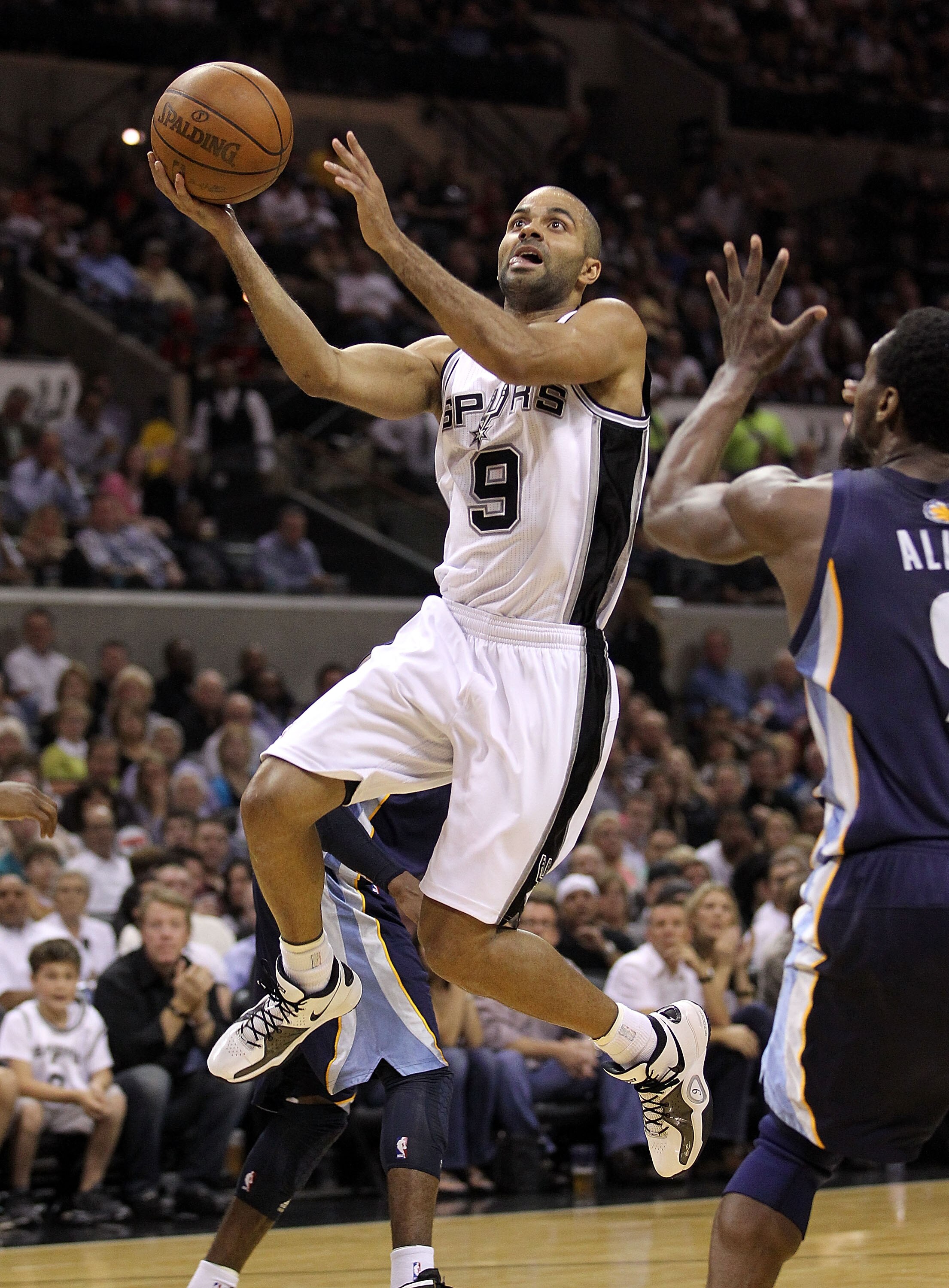 SAN ANTONIO, TX - APRIL 20:  Guard Tony Parker #9 of the San Antonio Spurs takes a shot against Tony Allen #9 of the Memphis Grizzlies in Game Two of the Western Conference Quarterfinals in the 2011 NBA Playoffs on April 20, 2011 at AT&T Center in San Ant