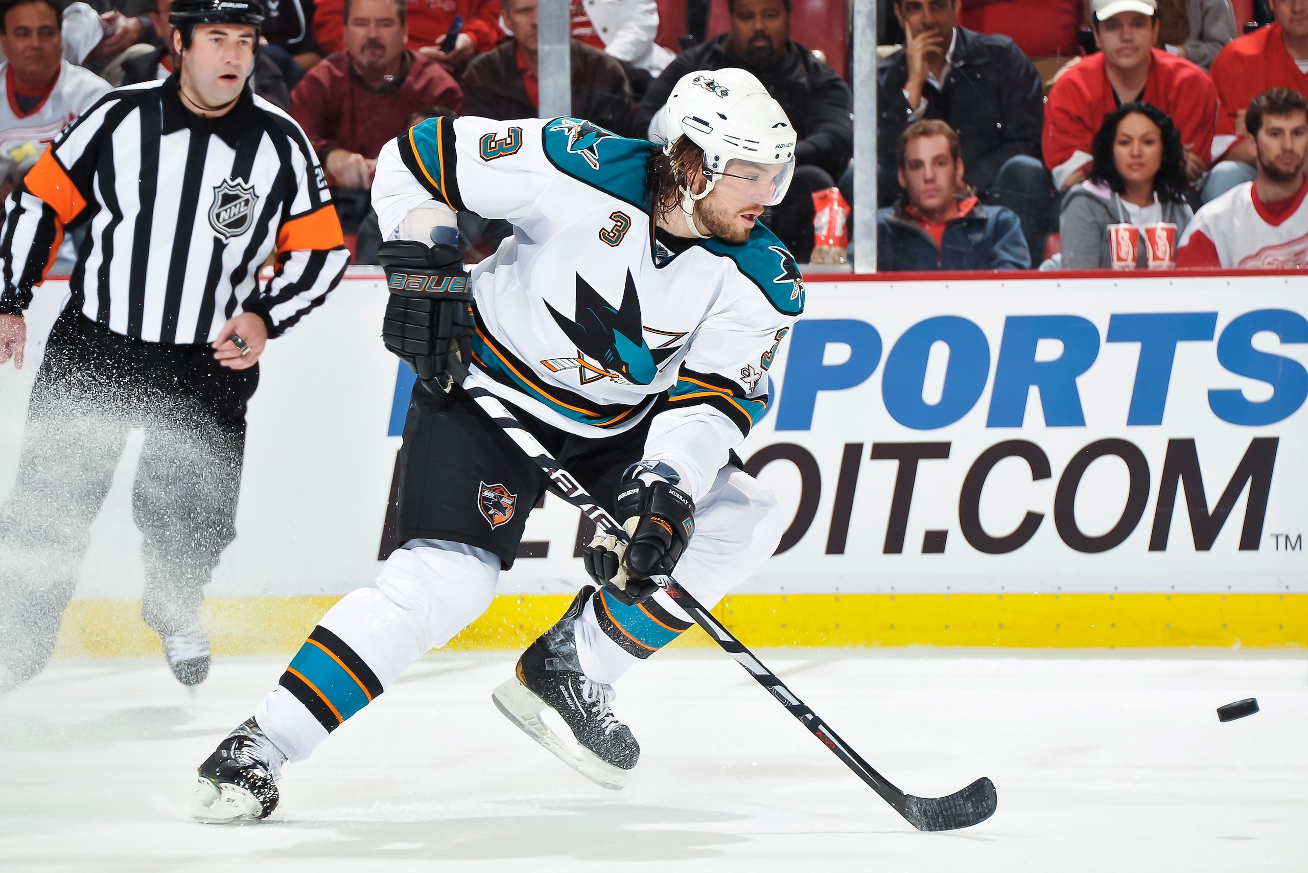 DETROIT - MAY 4: Douglas Murray #3 of the San Jose Sharks skates with the puck against the Detroit Red Wings in Game Three of the Western Conference Semifinals during the 2011 NHL Stanley Cup Playoffs on May 4, 2011 at Joe Louis Arena in Detroit, Michigan
