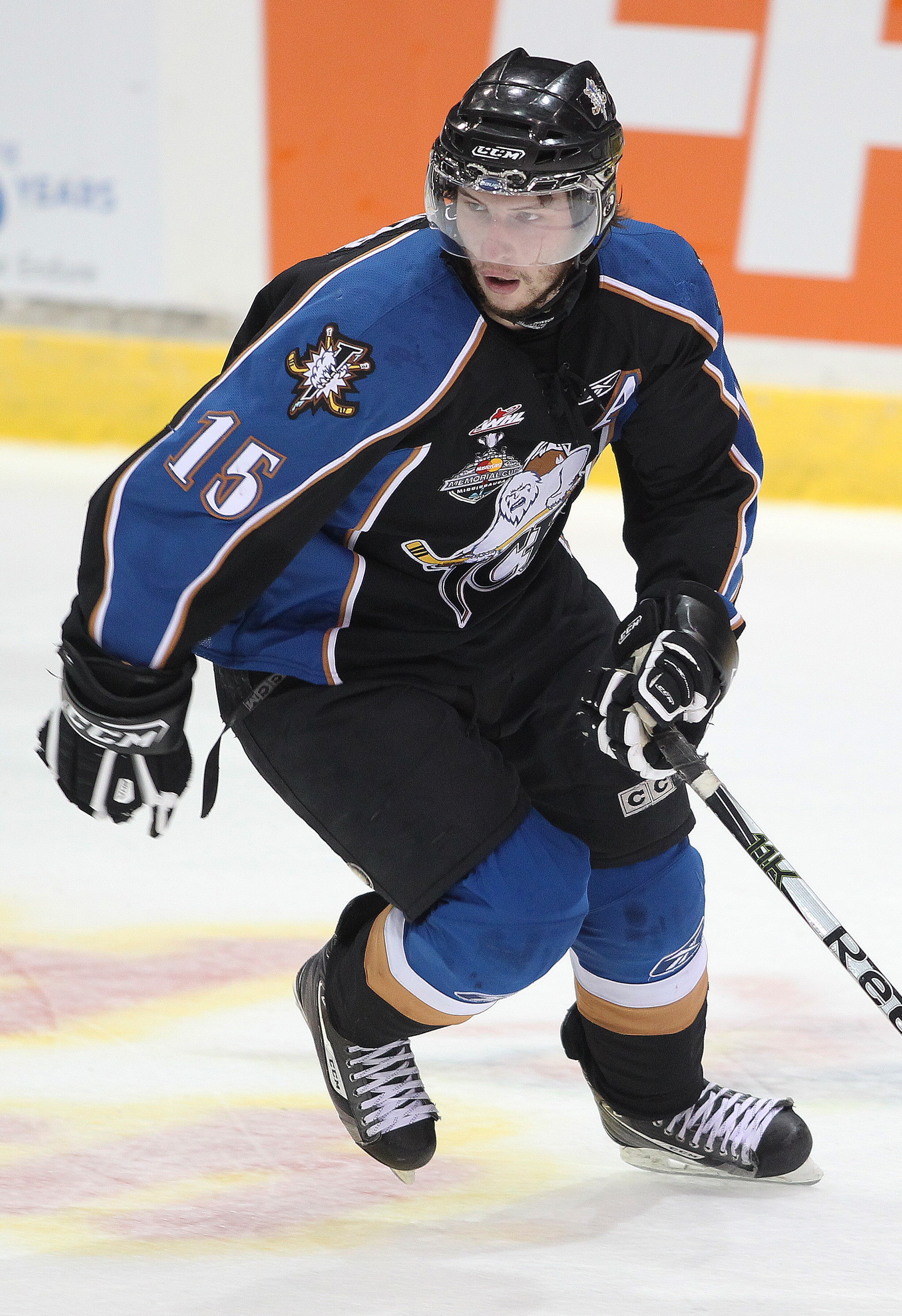 MISSISSAUGA, CANADA - MAY 21:  Steele Boomer #15 of the Kootenay Ice skates against the Owen Sound Attack during the 2011 CHL Mastercard Memorial Cup game on May 21, 2011 at the Hershey Centre in Mississauga, Canada. The Attack defeated the Ice 5-0. (Phot