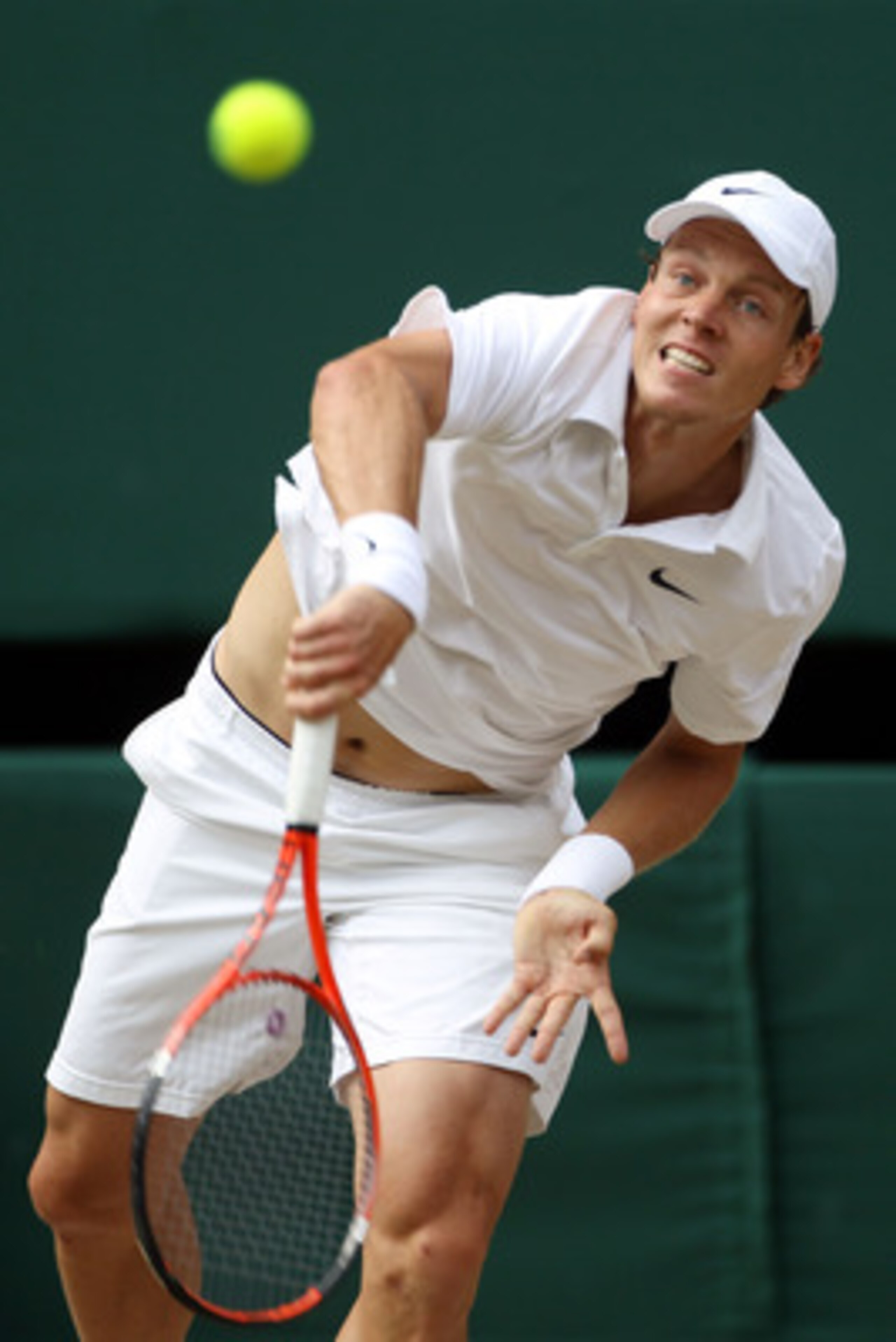 LONDON, ENGLAND - JULY 04:  Tomas Berdych of Czech Republic serves during the Men's Singles Final match against Rafael Nadal of Spain on Day Thirteen of the Wimbledon Lawn Tennis Championships at the All England Lawn Tennis and Croquet Club on July 4, 201
