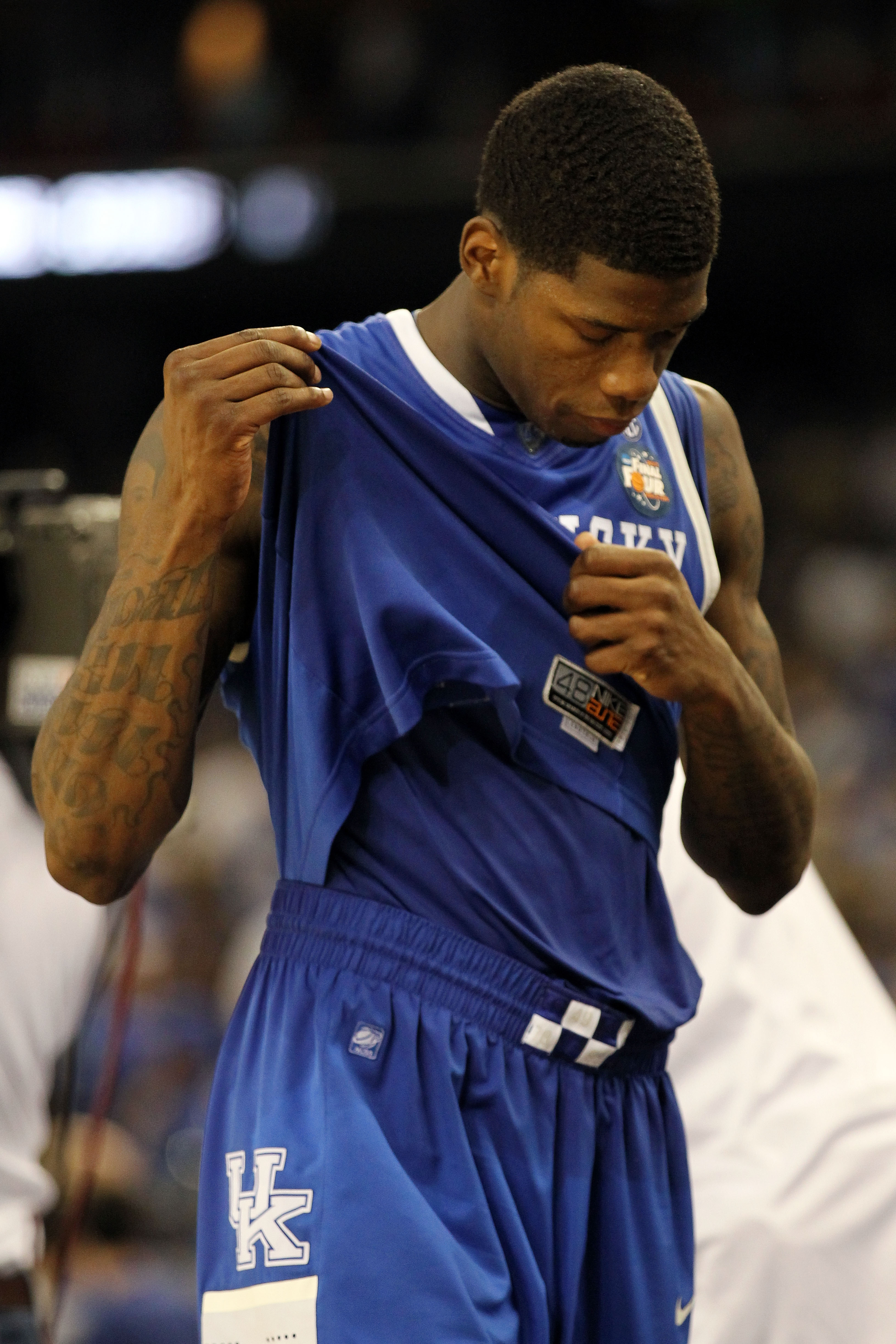 HOUSTON, TX - APRIL 02:  DeAndre Liggins #34 of the Kentucky Wildcats walks off the court after losing to the Connecticut Huskies during the National Semifinal game of the 2011 NCAA Division I Men's Basketball Championship at Reliant Stadium on April 2, 2