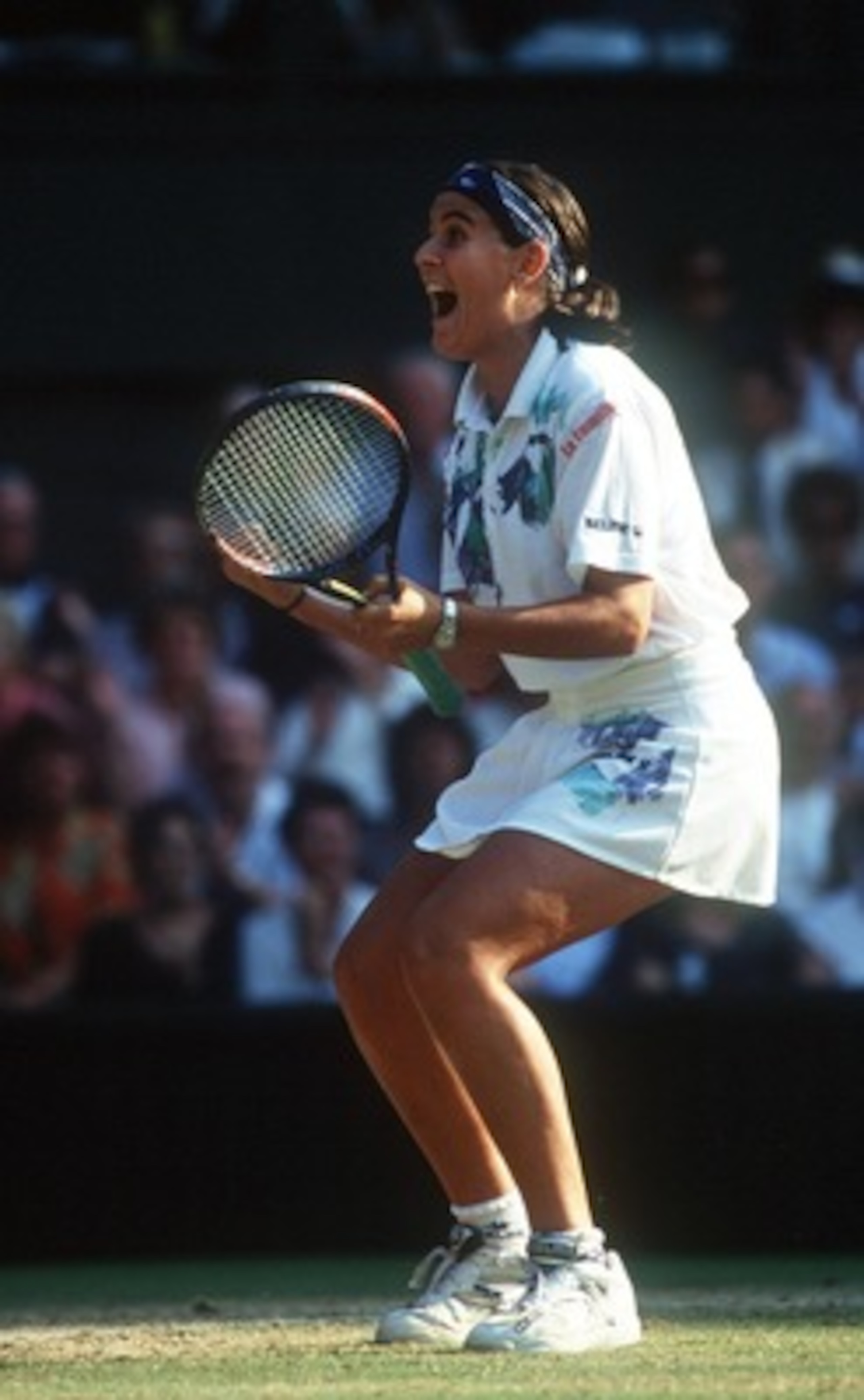 30 JUN 1994:  CONCHITA MARTINEZ OF SPAIN CLENCHES HER FISTS AND SHOUTS IN JUBILATION AFTER DEFEATING LORI MCNEIL OF THE USA ON MATCHPOINT IN THREE TENSE SETS. Mandatory Credit: Bob Martin/ALLSPORT