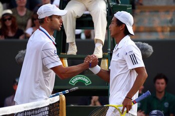 LONDON, ENGLAND - JUNE 28:  Yen-Hsun Lu of Taipei greets Andy Roddick of USA after defeating him on Day Seven of the Wimbledon Lawn Tennis Championships at the All England Lawn Tennis and Croquet Club on June 28, 2010 in London, England.  (Photo by Clive 