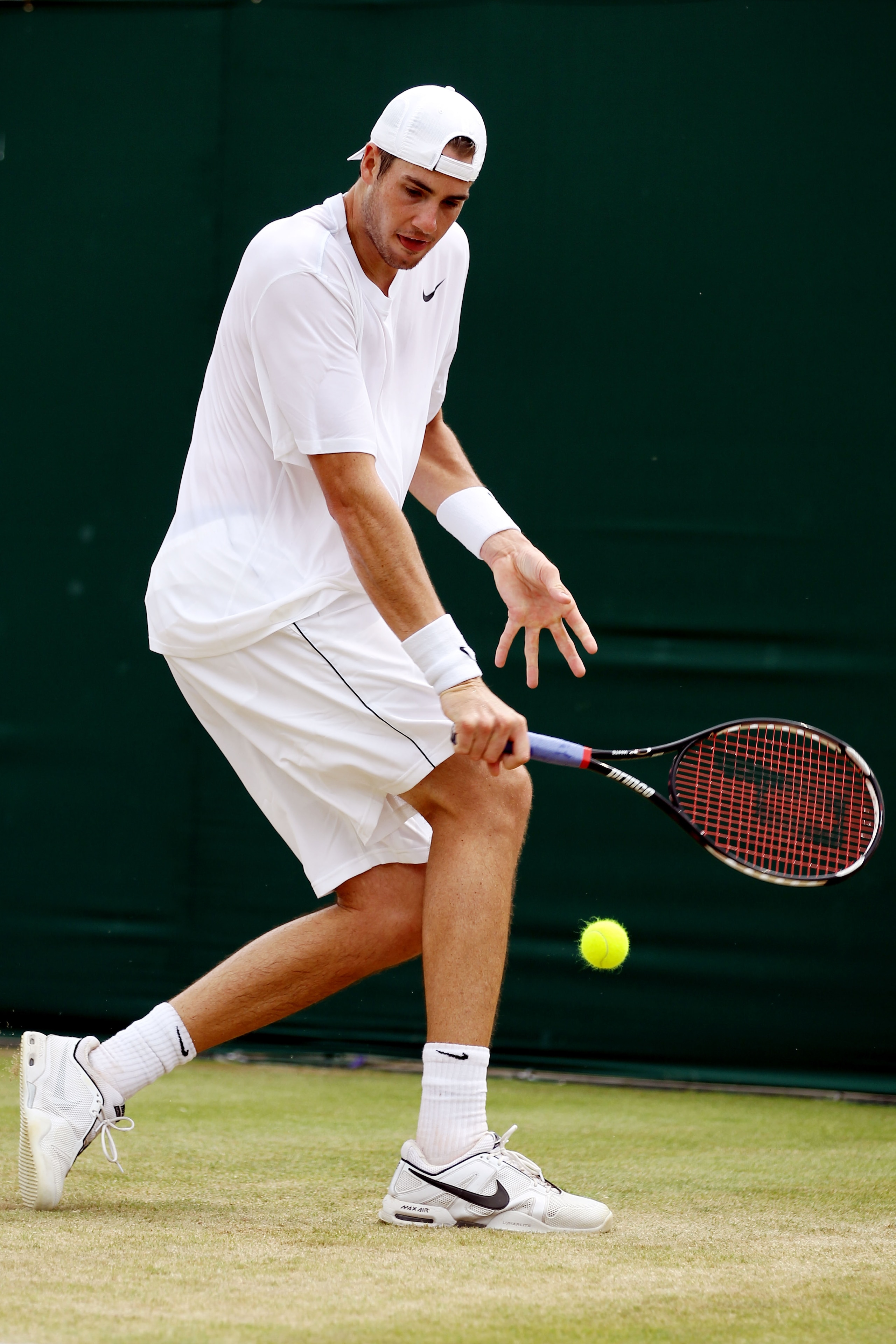 LONDON, ENGLAND - JUNE 25:  John Isner of USA in action during his match against Thiemo De Bakker of Netherlands on Day Five of the Wimbledon Lawn Tennis Championships at the All England Lawn Tennis and Croquet Club on June 25, 2010 in London, England.  (