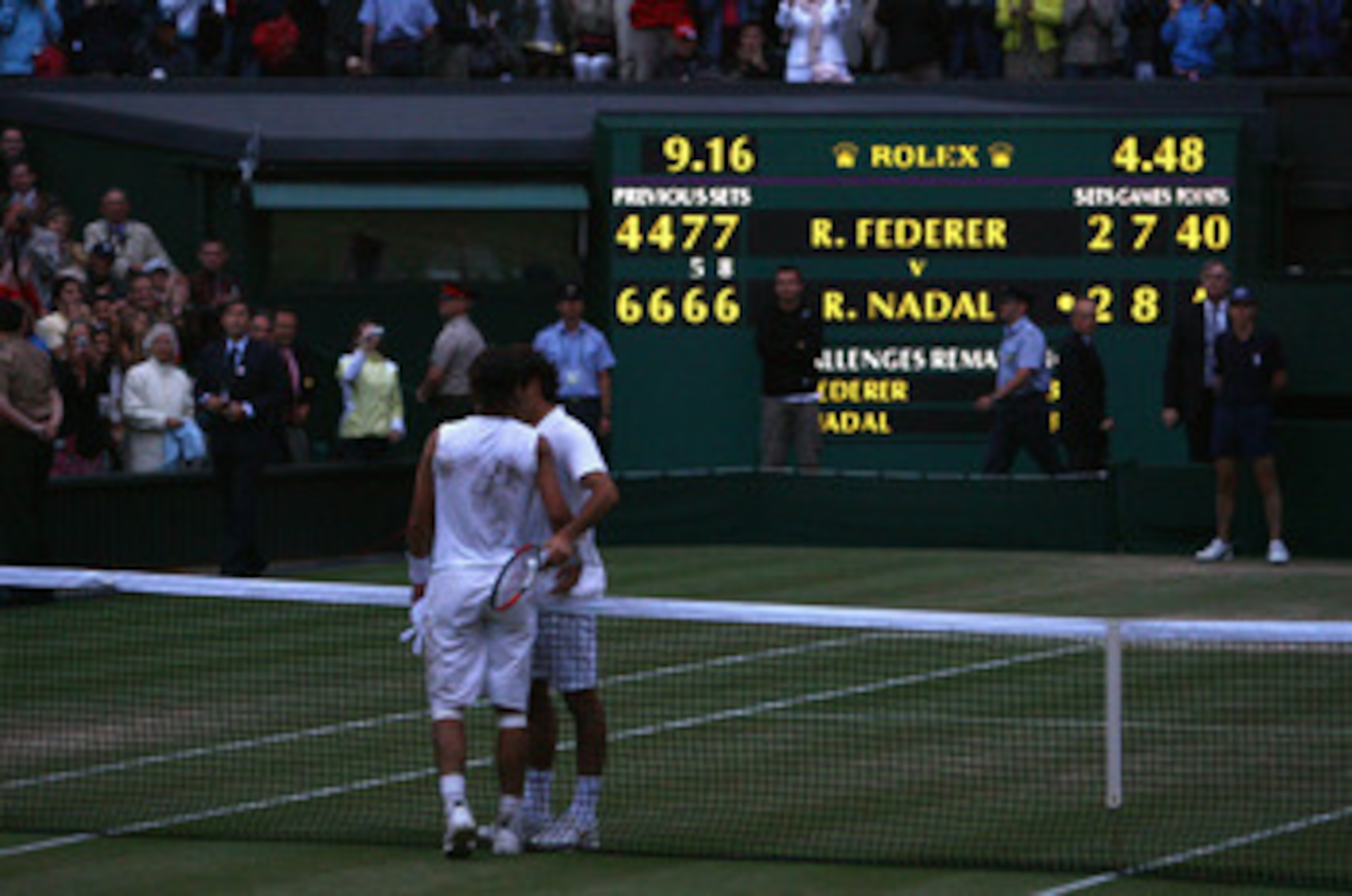 LONDON - JULY 06:  Rafael Nadal of Spain shakes hands with Roger Federer of Switzerland after Nadal won in five sets in the final on day thirteen of the Wimbledon Lawn Tennis Championships at the All England Lawn Tennis and Croquet Club on July 6, 2008 in