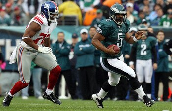 PHILADELPHIA - NOVEMBER 01:  Donovan McNabb #5 of the Philadelphia Eagles runs the ball past Osi Umenyiora #72 of the New York Giants on November 1, 2009 at Lincoln Financial Field in Philadelphia, Pennsylvania.  (Photo by Jim McIsaac/Getty Images)