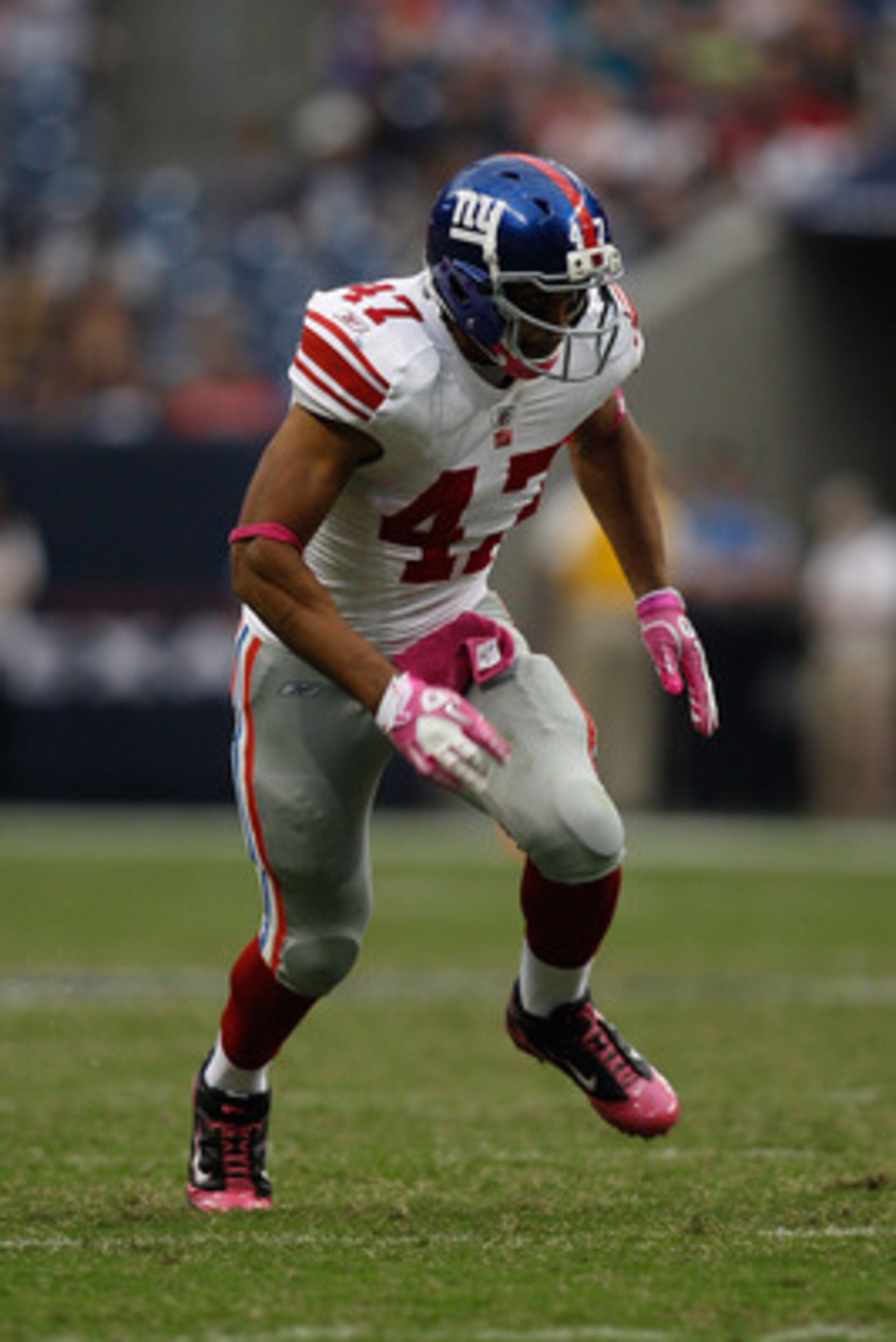 HOUSTON - OCTOBER 10:  Travis Beckum #47 of the New York Giants in action during the game against the Houston Texans at Reliant Stadium on October 10, 2010 in Houston, Texas.  (Photo by Chris Graythen/Getty Images)