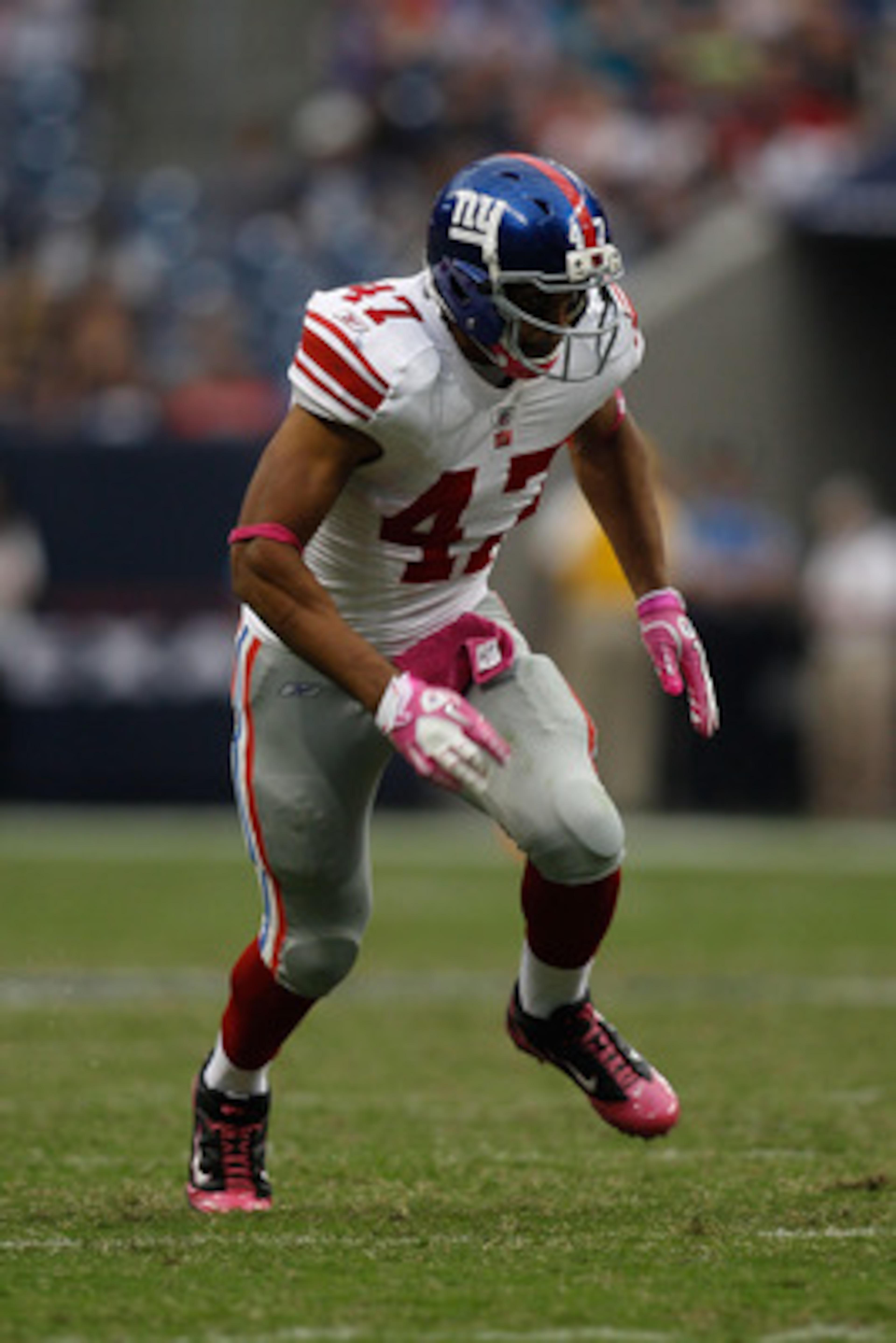 HOUSTON - OCTOBER 10:  Travis Beckum #47 of the New York Giants in action during the game against the Houston Texans at Reliant Stadium on October 10, 2010 in Houston, Texas.  (Photo by Chris Graythen/Getty Images)